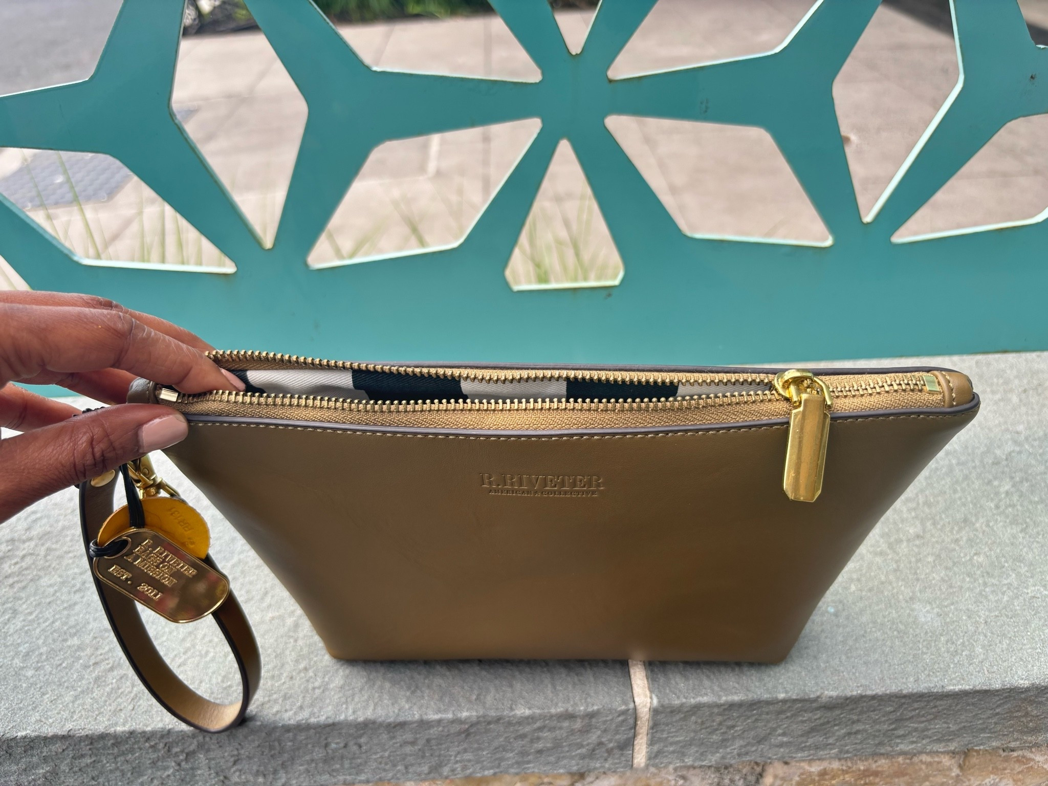 One thing I appreciate in a handbag is thoughtful design, and the R. Riveter Naomi Zipper Clutch checks all the boxes. I love the structured shape, the quality leather, and how spacious it is for my everyday essentials while still looking polished and elevated.

I’m linking this beautiful clutch because it’s become one of those timeless accessories that works with so many outfits. Whether I’m heading out for brunch, traveling, or dressing up for dinner, it’s the kind of piece I know I’ll keep reaching for.

#LTKootd #LTKU #LTKTravel