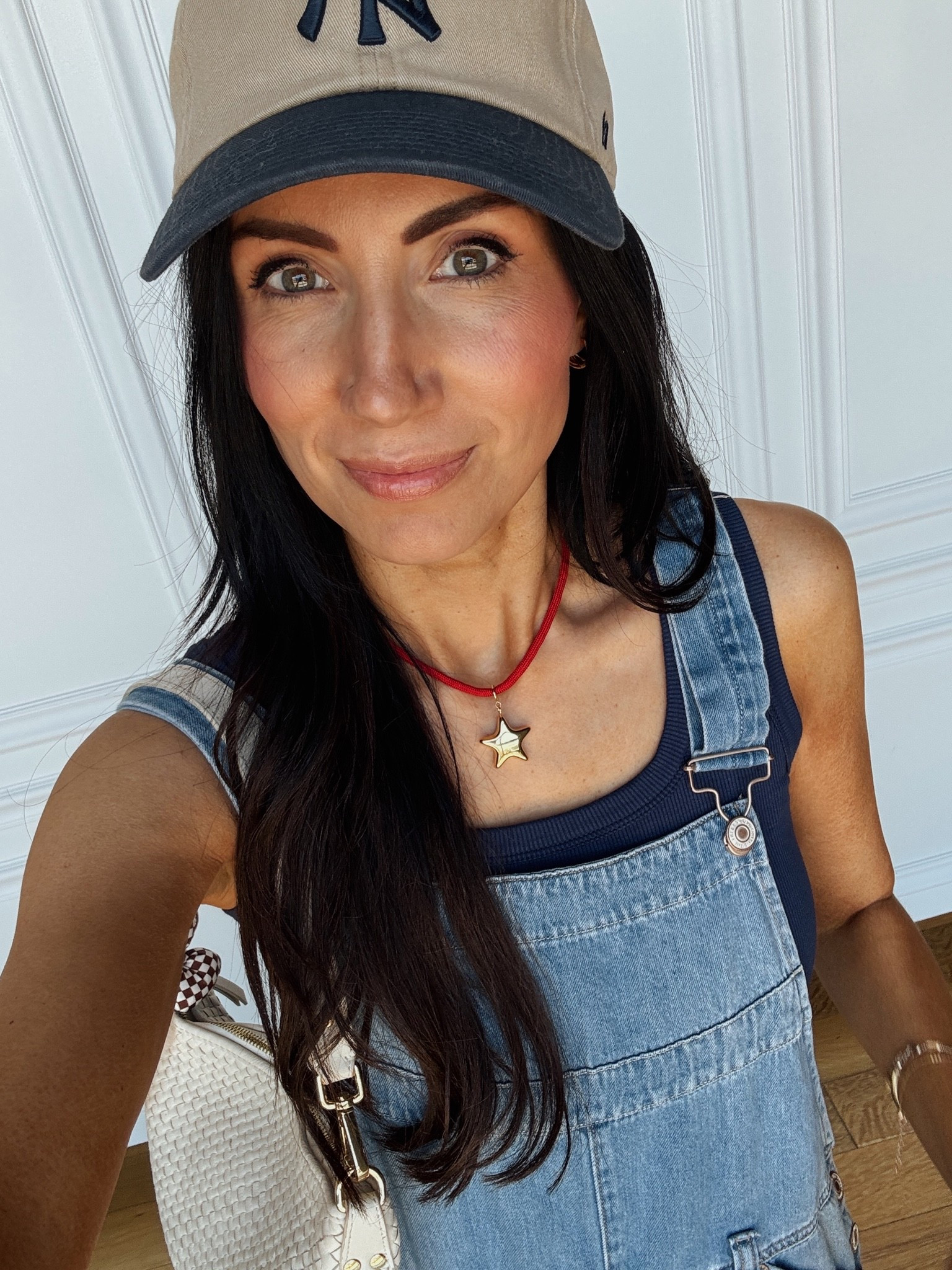 4th of July outfit inspo. Love a tank under some overalls- add a ballcap and a cool cord necklace.