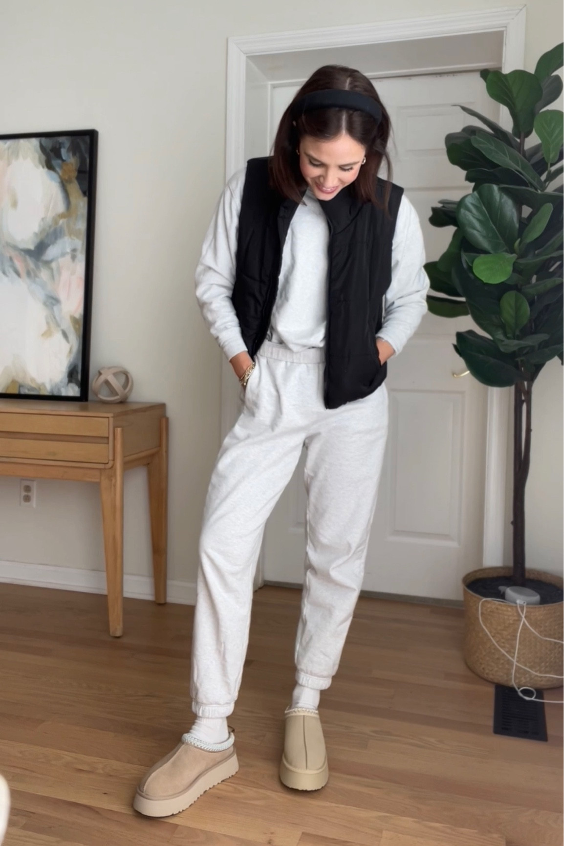 set is sold out community sweatshirt from aritzia but two similar options linked! 

Black vest : fits tts
Ugg tazz 
Black headband 
Matching set
Gray sweatpants 

#LTKfindsunder100 #LTKfindsunder50 #LTKstyletip