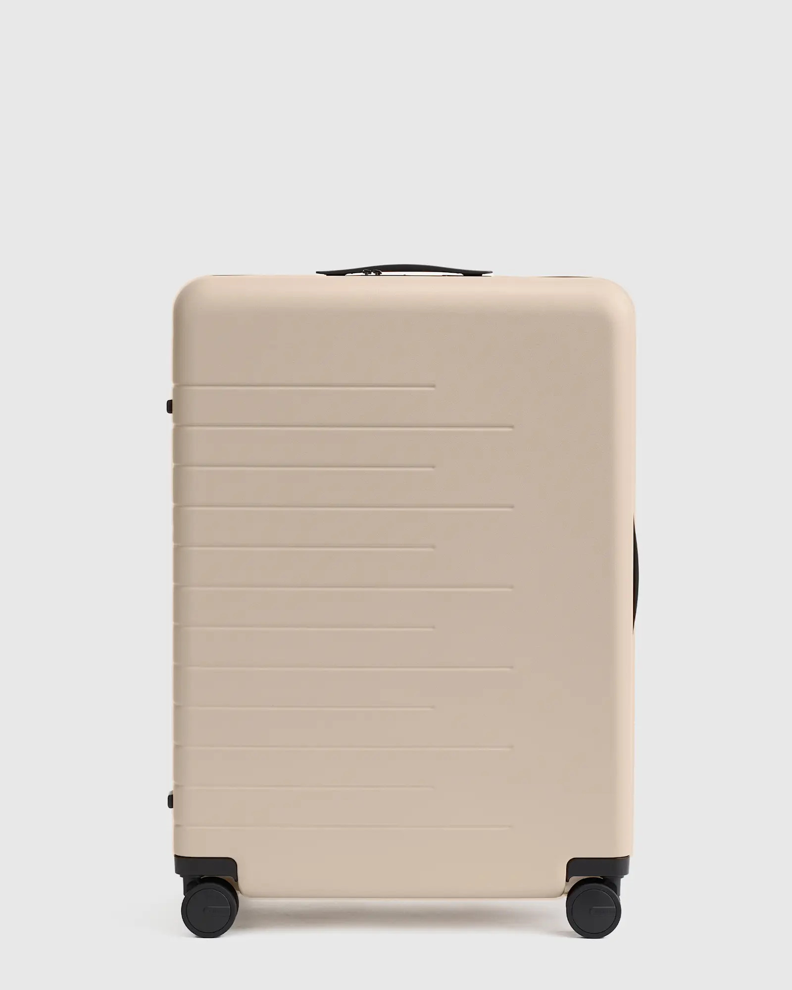 Medium Check-In Suitcase in Dark Green | Quince