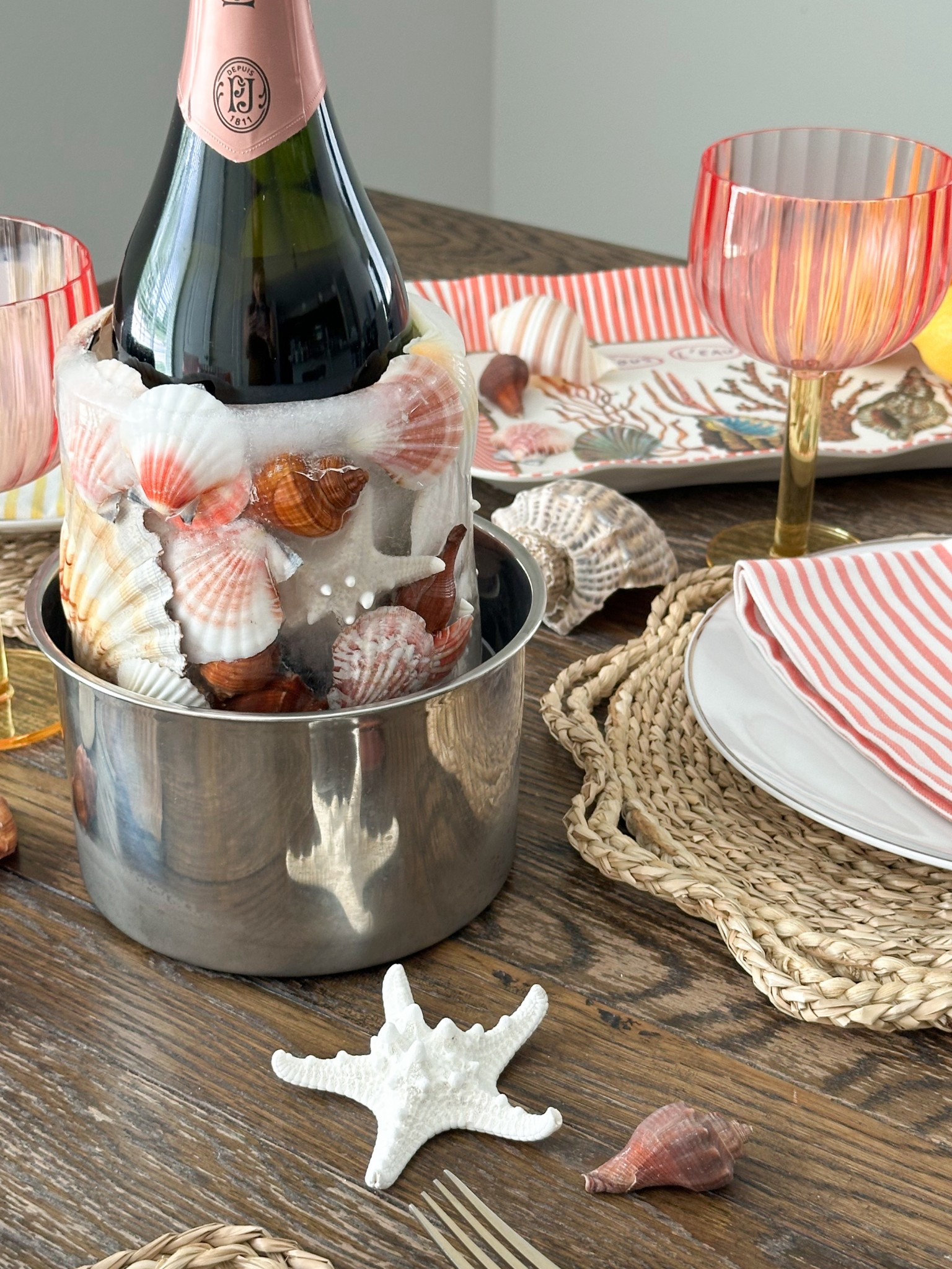 Love how my DIY wine chiller came out with seashells! This is such a fun and easy way to wow your guests and just this season! You can get so creative!!! 🐚

#LTKHome #LTKSeasonal