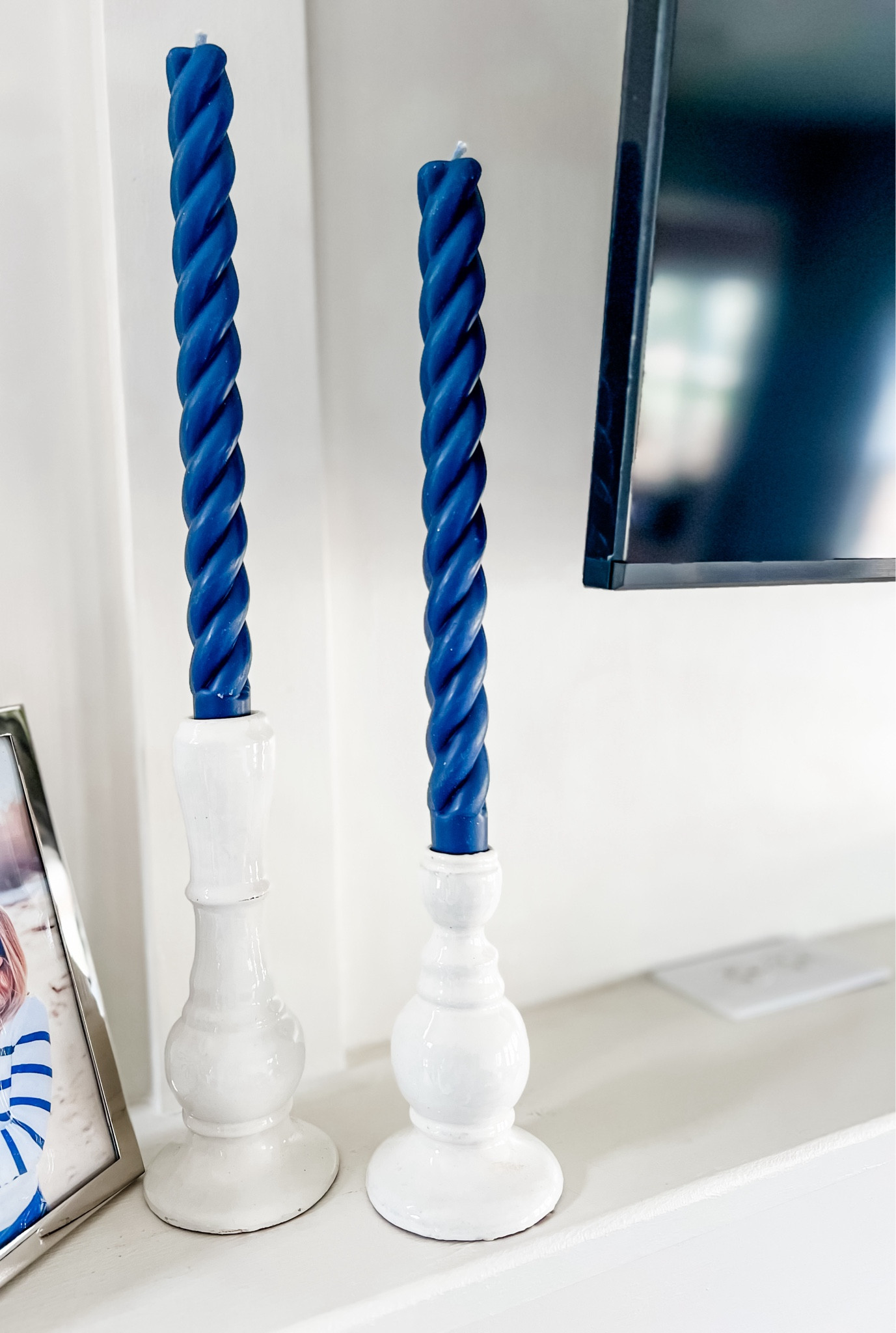 Added two twisted taper candles in indigo to my mantle. Candlestick holder set is on sale for under $30, normally $59. 
Home decor, candles, mantle decor, tapered candles, candlestick, blue and white decor 

#LTKSaleAlert #LTKHome