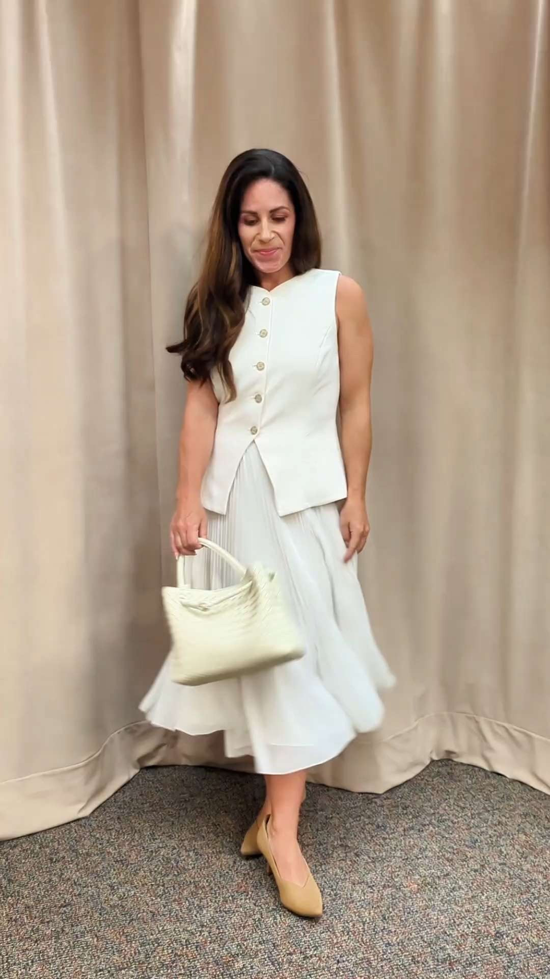 Yes, it's okay to wear white after Labor Day! My workwear ootd mixes style and function - ideal for long days in the classroom. The floaty pleated skirt from Aritzia is incredibly comfortable. The elastic waistband moves with you, while the pleats swirl gracefully. Pair it with the matching vest (Light Birch colorway) for a sleek monochrome look. Finish things off with "all day comfort" pumps and a matching woven bag for a textural element.

workwear | office outfit | pleated skirt | workwear vest | monochrome outfit ideas | petite-friendly workwear  

 #LTKPetite #LTKStyleTip #LTKWorkwear