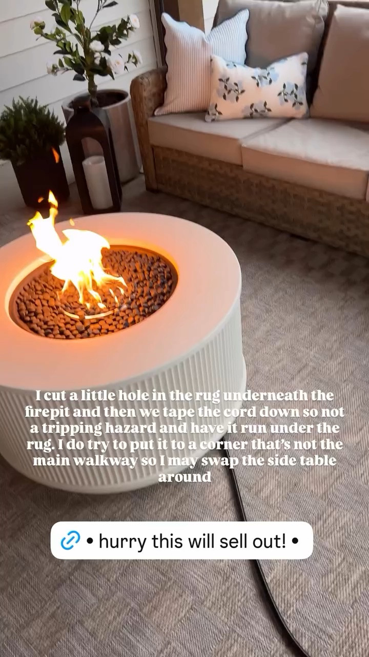 I cut a little hole in the rug underneath the firepit and then we tape the cord down so not a tripping hazard and have it run under the rug. I do try to put it to a corner that’s not the main walkway so I may swap the side table around