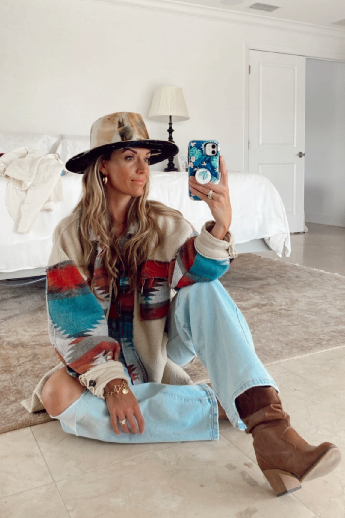 This aztec shacket is perfect for traveling , bon fires, or snuggling up at home. It’s SOO soft on the outside and inside. The style is meant to be worn oversized. I’m wearing a medium. 
The hat was made by my cousin at Gem Hats, but she is backed up currently (because yes she’s that good!). I found similar hats , and added them Here if you don’t have any to wait!
#tribalprint #shacket #mountainjacket #fallshacket #fallshackets #fleeceshackets

#LTKunder50 #LTKstyletip #LTKSeasonal