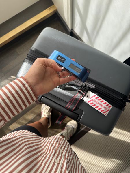 Holiday traveling season is here! Always wondering if that bag is overweight?! Grab this little travel luggage scale so you can always check the weight! 

Luggage scale, travel luggage scale, overweight bags, luggage, travel tip, heavy bags, holiday travel, winter travel, scale, Amazon find

#LTKHoliday #LTKtravel #LTKSeasonal