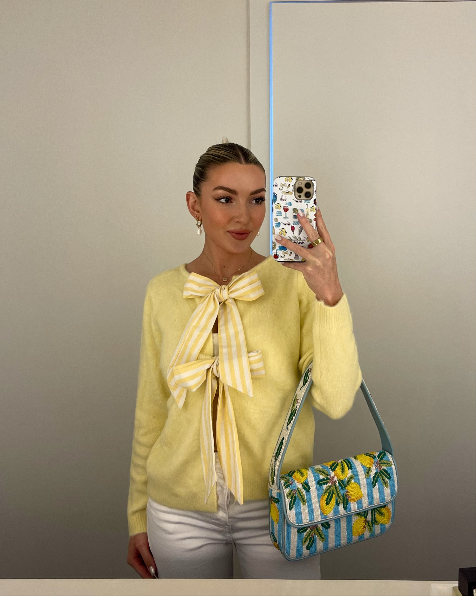 butter yellow sweater and my cute lemon beaded handbag—two super big fashion trends this spring and summer 

#LTKSeasonal #LTKItBag #LTKFindsUnder100