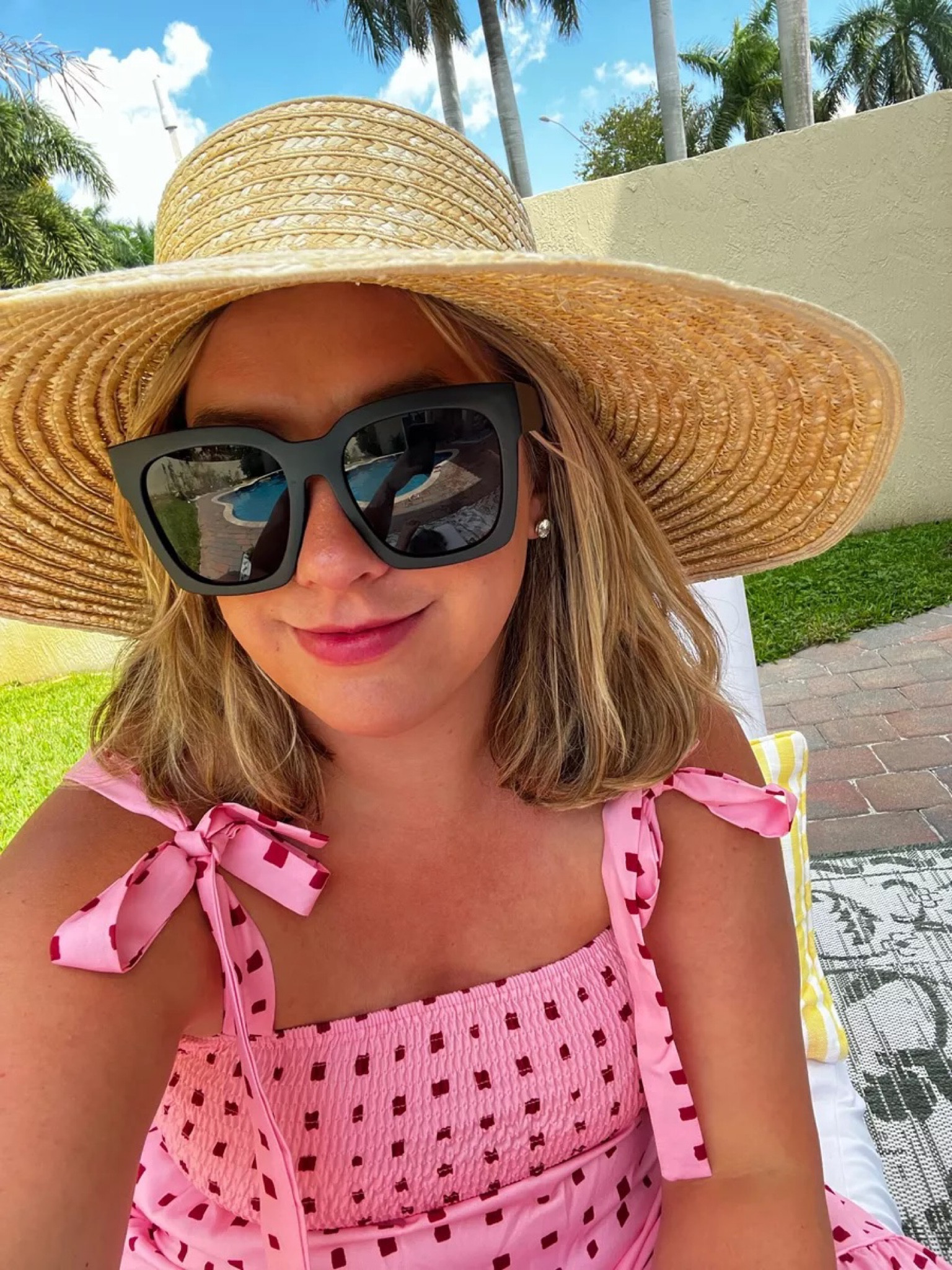 Spring outfit, pool chaise lounges, outdoor rug, pink printed dress, large straw hat, pink maxi dress, pink summer dress

#LTKwedding #LTKunder50 #LTKstyletip