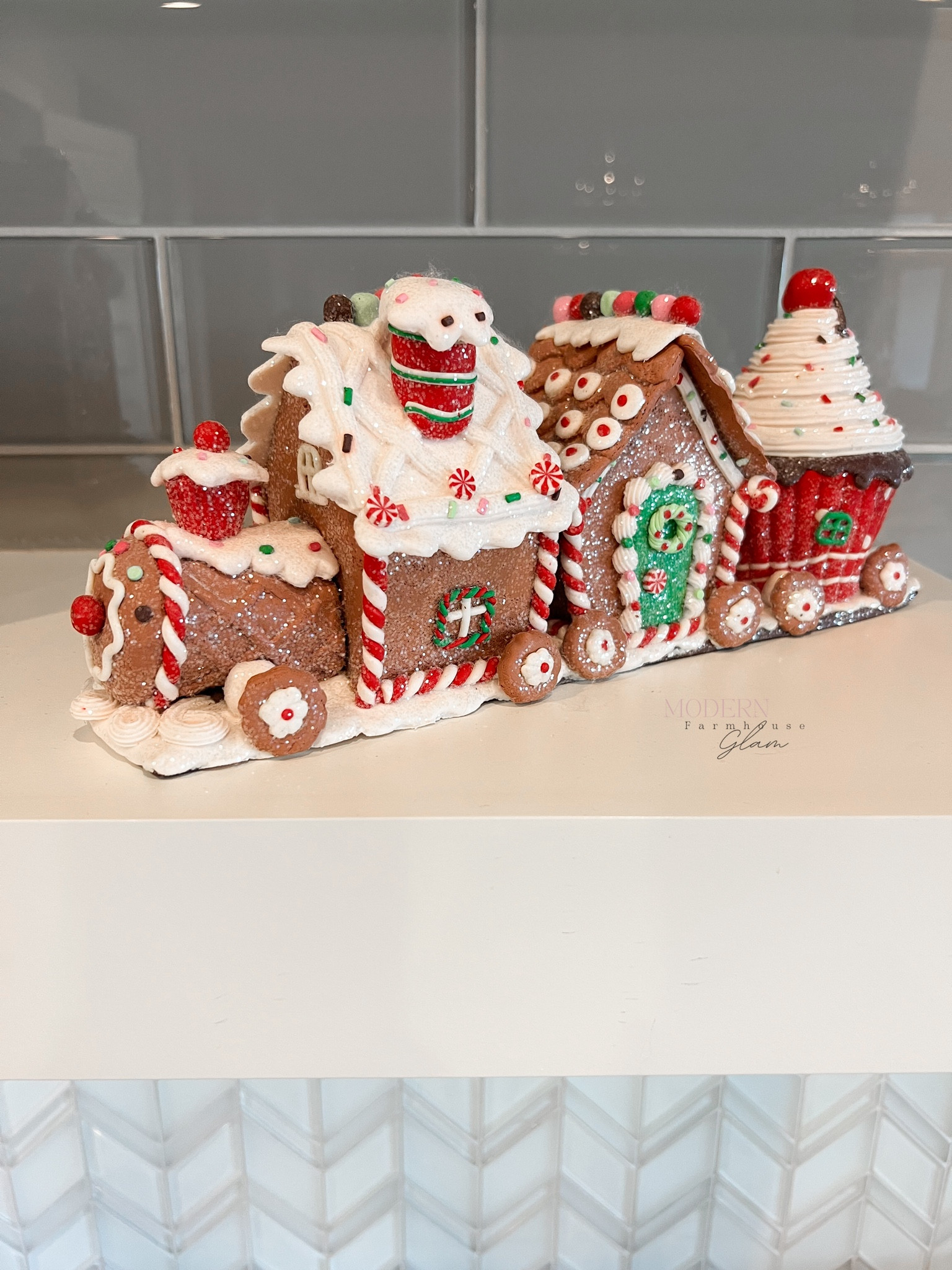 The cutest gingerbread house train at Modern Farmhouse Glam. Christmas decorations  

#LTKHoliday #LTKSeasonal #LTKhome