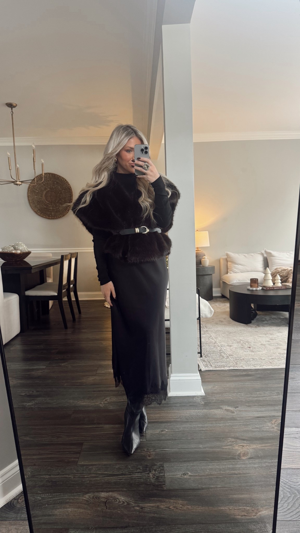 This faux fur vest is SO chic! I love the dark brown color. I have it dressed up here and belted but it can easily be worn with jeans and a long sleeve for a more everyday look. 

#LTKHoliday #LTKFindsUnder100 #LTKSeasonal