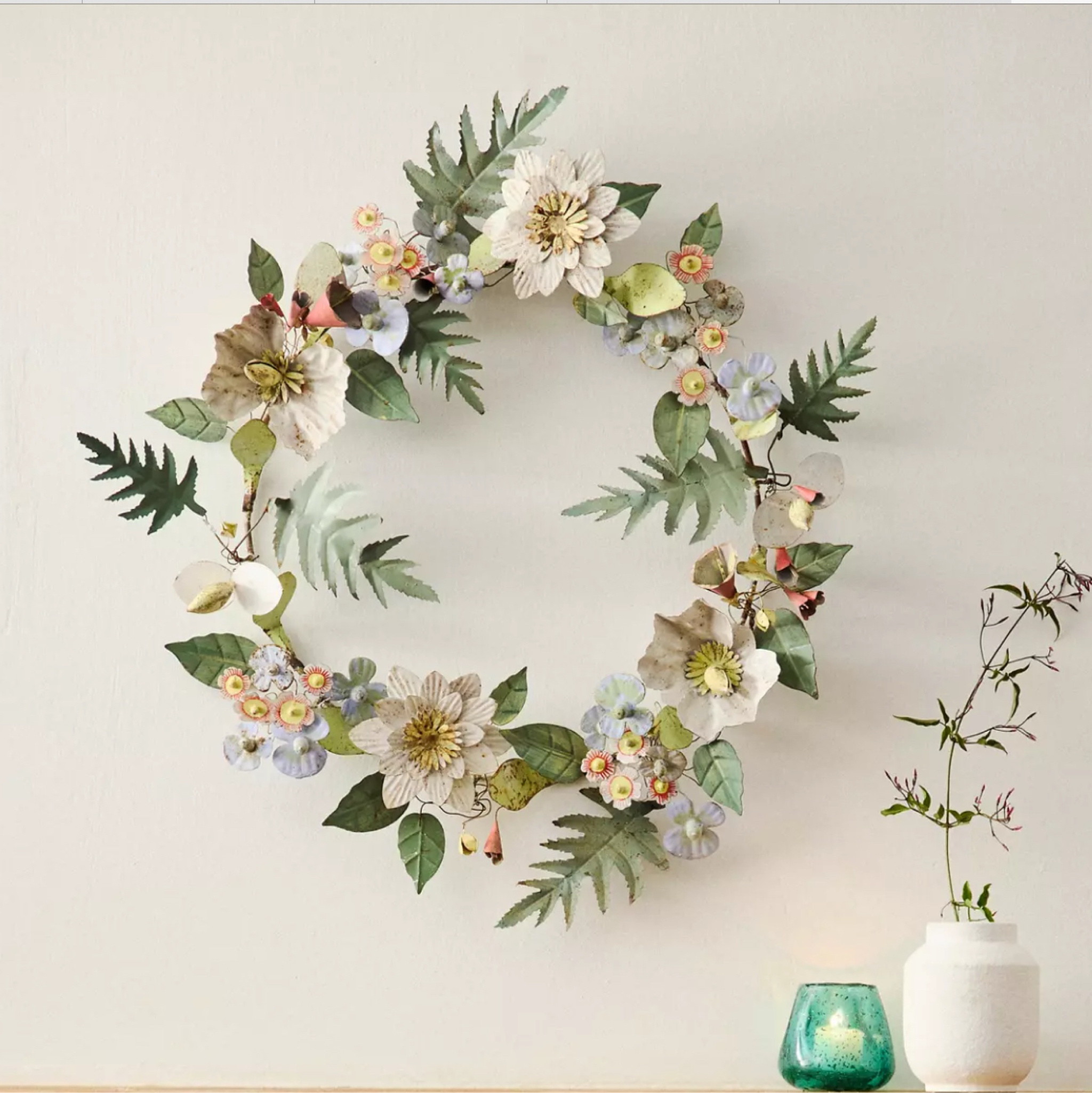 Bring home the lush look of a tropical garden with this wreath of iron blooms, each one hand-crafted exclusively for terrain.

#LTKHome #LTKSeasonal