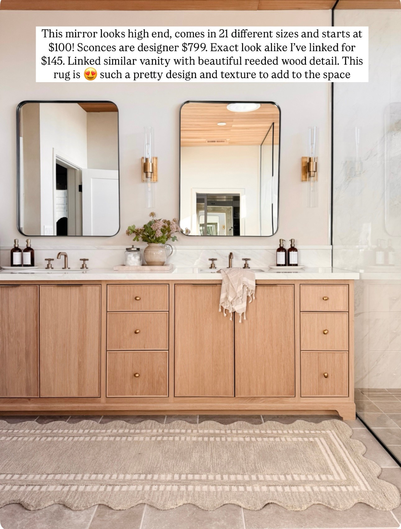 Wood vanity scallop rug runner, scallop, brass faucet, plumbing, brass hardware, black rectangular mirror, glass panel gray tile brass sconces Wayfair pink flowers Amazon 

#LTKSaleAlert #LTKFindsUnder100 #LTKHome