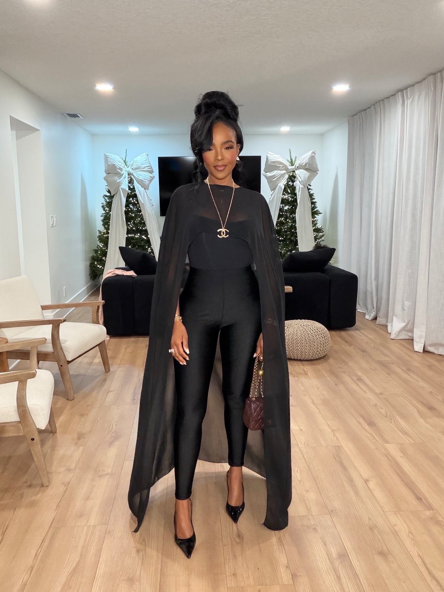 A sleek all-black holiday moment — effortless, dramatic, and perfect for every event on your calendar. The cape elevates the entire look, and the fit of these pieces makes getting ready so easy during the busy season. With Black Friday and Cyber Monday deals still live through December 1, it’s the perfect time to build your holiday wardrobe.

Perfect for holiday parties, winter nights out, and elevated seasonal events.

📏 Sizing: Small
Height — 5’4” | 138 lbs | Bust — 34D | Waist — 27” | Hips — 40” | Jeans/Pants — 27 Long or 4 Long

Favorite to revisit later

chic all-black outfit ideas, holiday night-out look, elegant cape styling, winter outfit inspiration, elevated minimal holiday style

Follow me on Instagram and YouTube @kirasfashionfinds

#LTKootd #LTKHoliday #LTKPetite