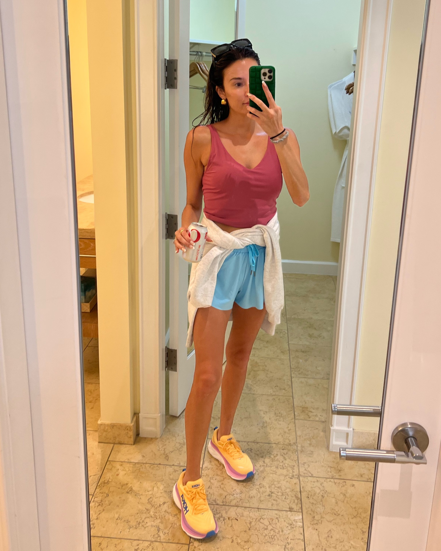 Travel day OOTD ✈️ wearing some of my favorite athleisure pieces! These earrings are my fave gold hoops right now and are under $15. 

Sizing:
Shorts - medium
Top- medium 
Sneakers - TTS

Travel style; atheleisure style; athleisure outfit; travel outfit; mom style; school drop off outfit; workout outfit; Hoka; amazon fashion; comfy outfit; workout shorts

#LTKstyletip #LTKtravel #LTKfit