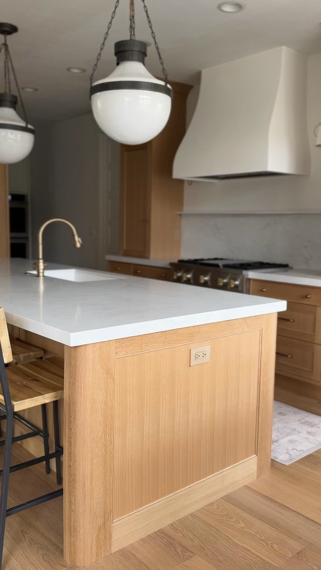 Want a kitchen that feels warm and still has a little contrast? 🤎 The globe pendants against this white oak are such a good detail to notice. Adam built the cabinetry in this client’s home. I’ve linked the Rejuvenation Marcella pendant so you can explore the size and finish options for your own space. Tap the product below to shop.

#LTKHome