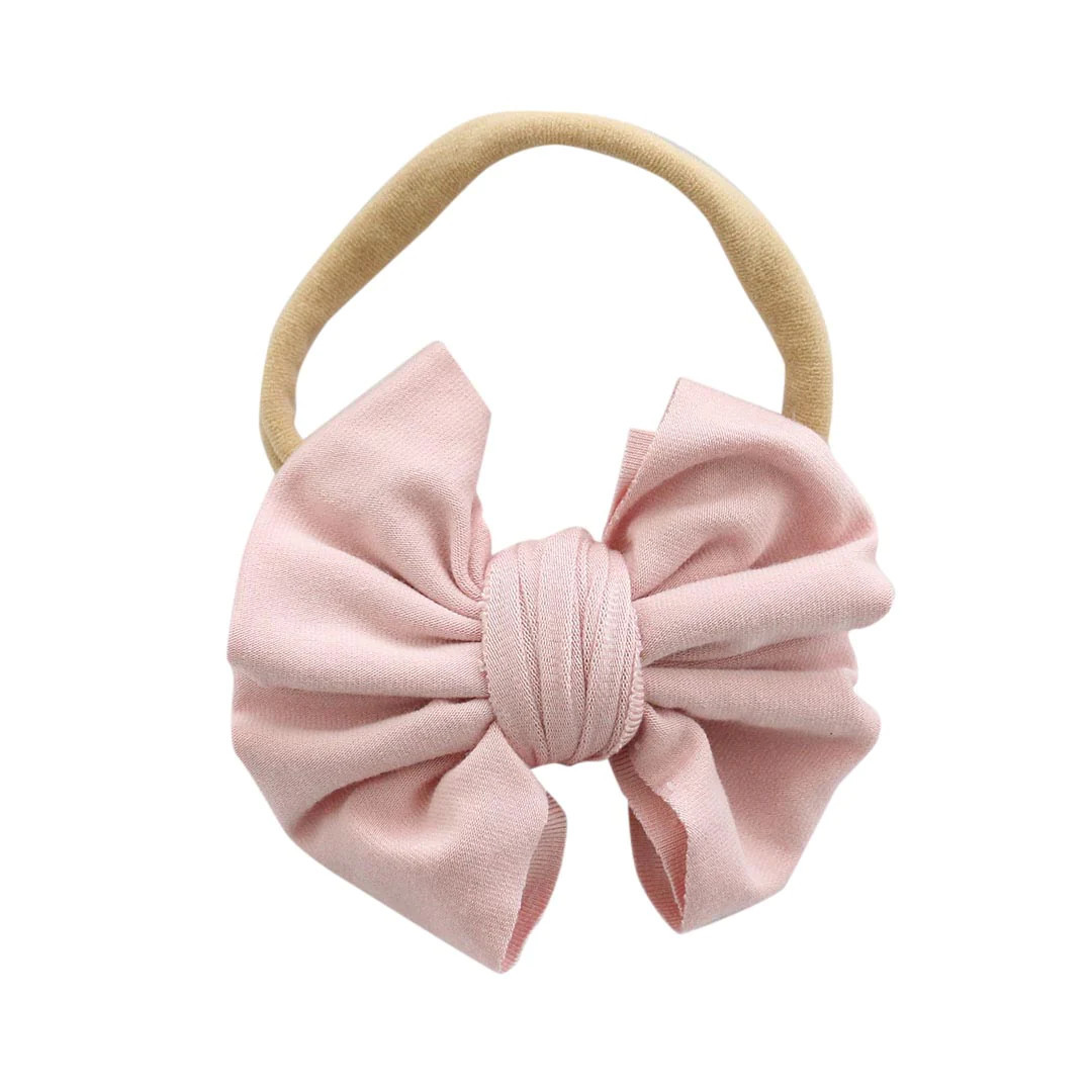Solid Petal Pink Knit Bow Headband | Caden Lane