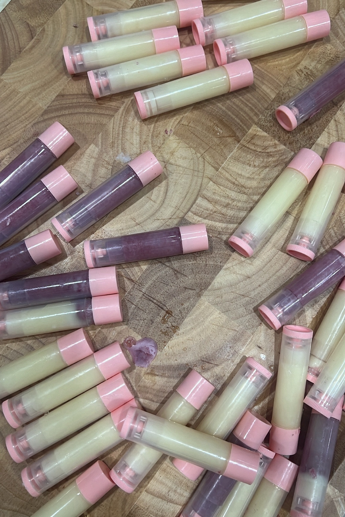 DIY all natural chapstick 😚

To make heat the following in a double boiler then add to your (50) chapstick tubes. Let them sit for 20 mins to dry. 

1 cup of beeswax 
1 cup of cocoa butter - next time I may try mango butter bc it was more chocolatey than I expected lol
4 big spoonfuls of coconut oil 
2 spoonfuls of beef tallow (optional)
4 half droppers of vitamin e oil

We added beet root powder for color but for as dark as it looks it actually doesn’t add color to your lips haha. 

We also added vanilla but it didn’t add any flavor. I think it’s because you’re supposed to add the oils when you take it off the heat? Oops. Next time we want to try peppermint oil! 

We meant to add honey to the mix but forgot. Definitely trying it next time though!