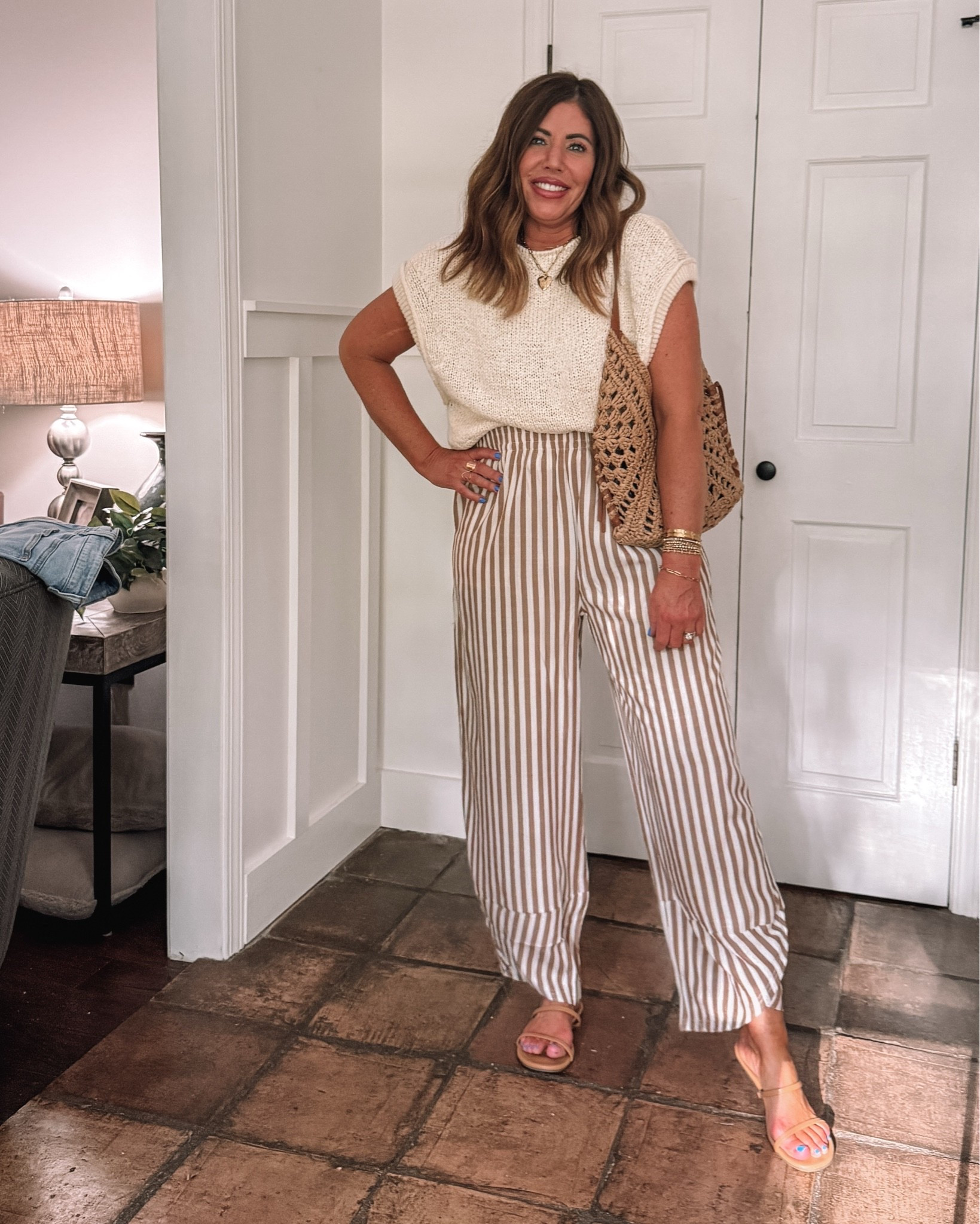 Super cute outfit for summer: perfect to wear to a business, casual office and more!

Oversized textured sweater vest/size medium

Rayon blend high-rise pants/size large

Look for less sandals/true to size
Rattan shoulder bag

#LTKSaleAlert #LTKOver40 #LTKootd