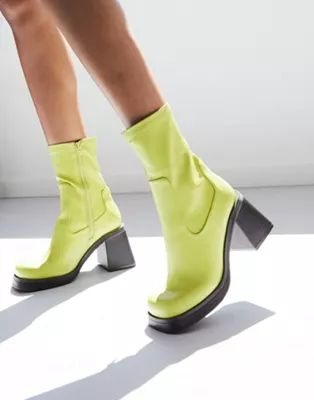 ASOS DESIGN Reversed mid-heel sock boots in green | ASOS (Global)