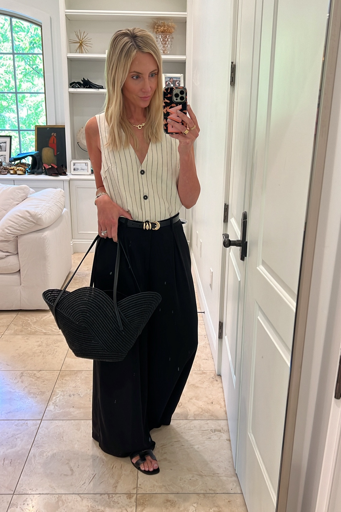 Black pants 
Vest top - tts 
Straw bag


#LTKFindsUnder50 #LTKStyleTip