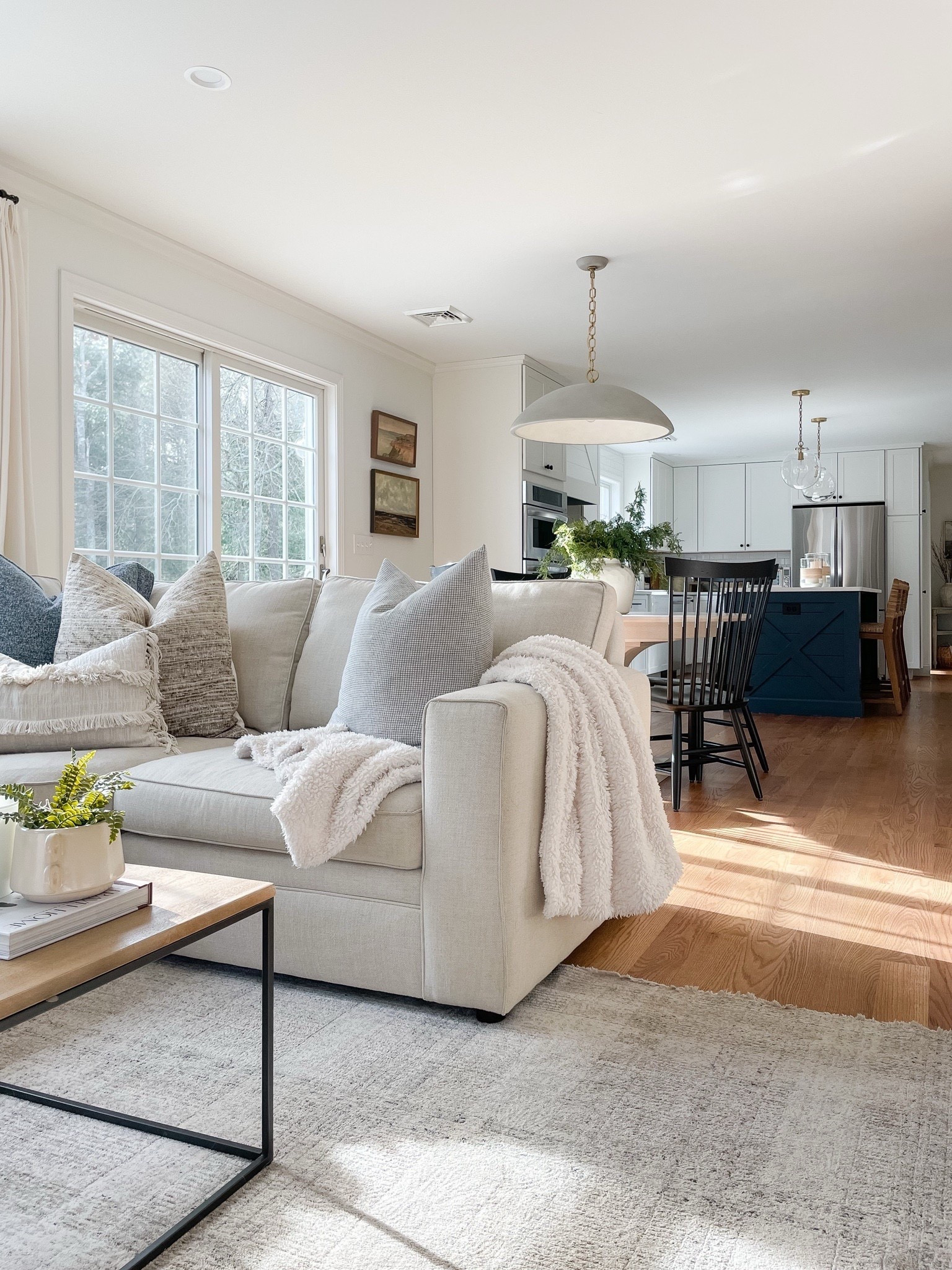 Pottery barn sectional, Loloi rug, throw pillows and blankets, pendant lights wall art 

#LTKFindsUnder100 #LTKHome #LTKFindsUnder50