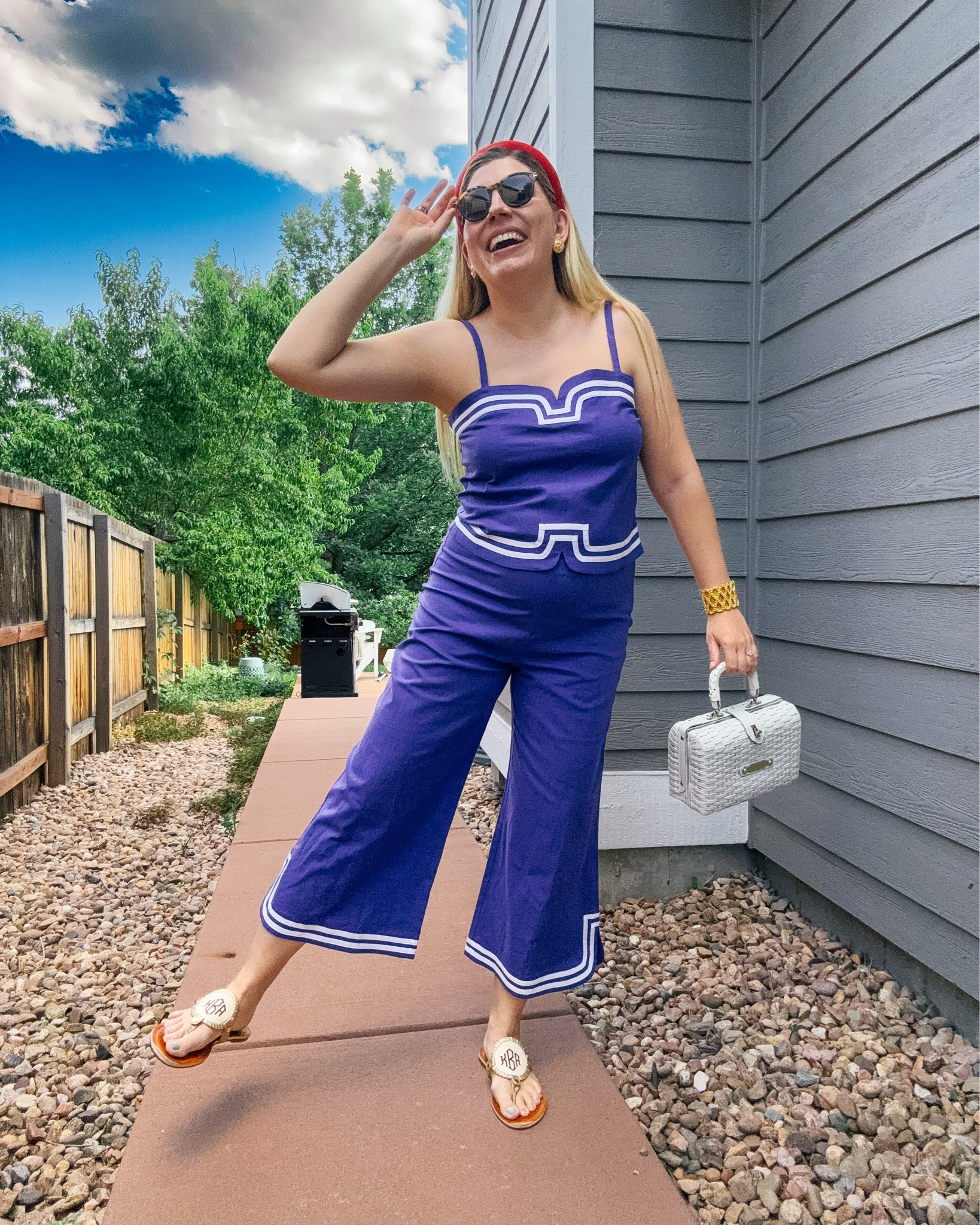 Look 17
Coastline Calling Capsule 

I might be running errands, but in my mind I’m poolside in a Slim Aarons photo. This Trina Turk set is beyond cute! It’s got bold lines, nautical trims, and the perfect amount of vintage drama. 

Part of Coastline Calling—a curated capsule of maximalist summer style. Think East Coast nostalgia, statement silhouettes, and playful polish you can wear anywhere. Follow along for daily looks and shop the edit via LTK.

Top & Pants - Trina Turk (linked)
Shoes - Marleylilly (linked)
Bag - Vintage (similar linked)
Headband - TJ Maxx (similar linked)
Earrings - Vintage (similar linked)
Sunglasses - Tom Ford (linked)
Bracelet - Lilly Pulitzer (linked)
Rings - Rocksbox (similar linked)

#CoastlineCalling #TrinaTurk #TrinaTurkStyle #RetroResortwear #MaximalistFashion #CapsuleWardrobe #EastCoastStyle #YachtClubVibes #StatementSet #SummerOOTD #LTKStyle #CoastalStyle #EditorialStyle #StyledMyCloset #ModernPreppy #LandlockedButMakeItGlam #SummerStyleEdit 

#LTKStyleTip #LTKSeasonal #LTKShoeCrush