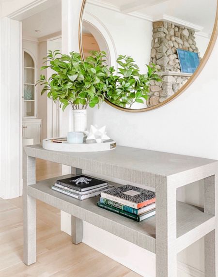 Front entry console table round mirror faux greenery 

#LTKStyleTip #LTKHome #LTKFindsUnder100