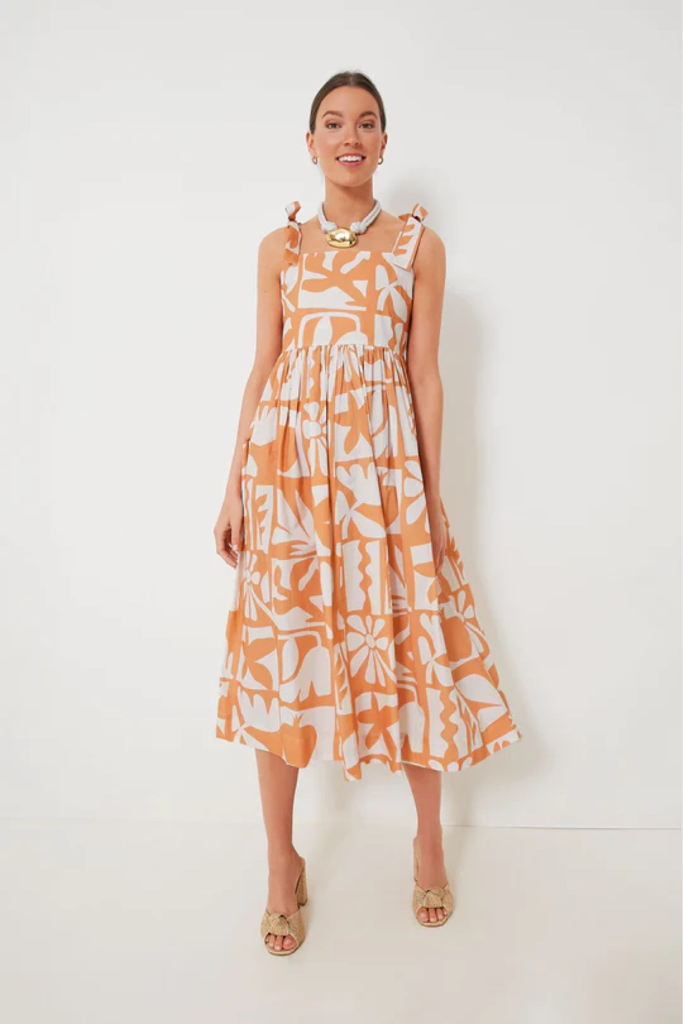Beautiful printed orange and white dress with ties at shoulder

#LTKstyletip #LTKSeasonal