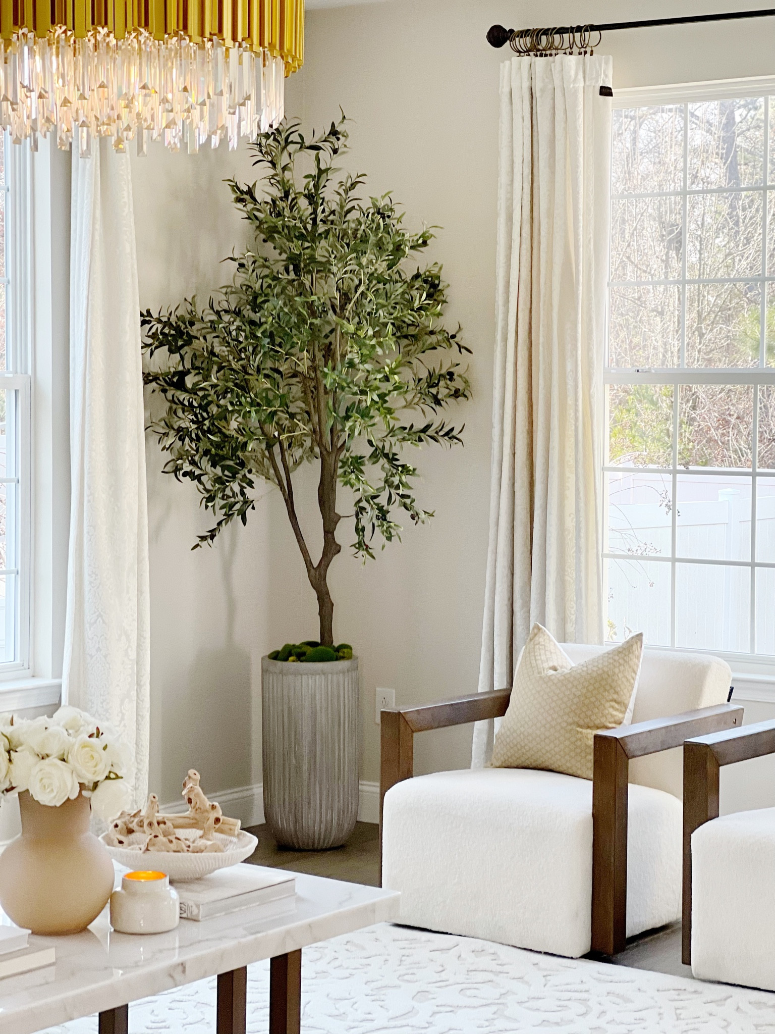 Shop my 7ft olive tree and planter!
 7ft olive tree 
Crystal chandelier 
Fluted concrete planter 


#LTKSeasonal #LTKFind #LTKhome