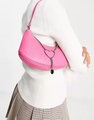 Urban Revivo curved shoulder bag with heart chain detail in pink | ASOS (Global)