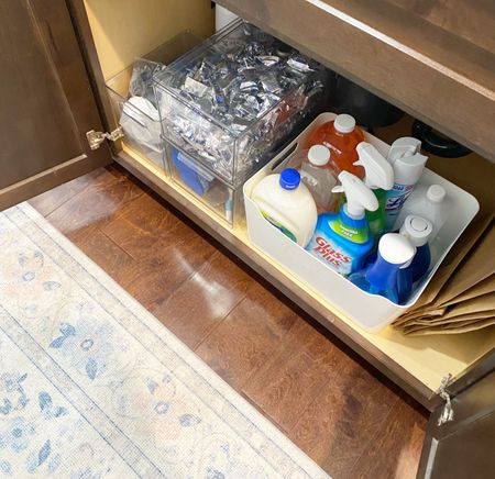Under sink organizing 

Cabinet organizer 
Clear bin container white container cleaning #cleaning #organizing #homedecor #rug 

#LTKstyletip #LTKhome #LTKsalealert