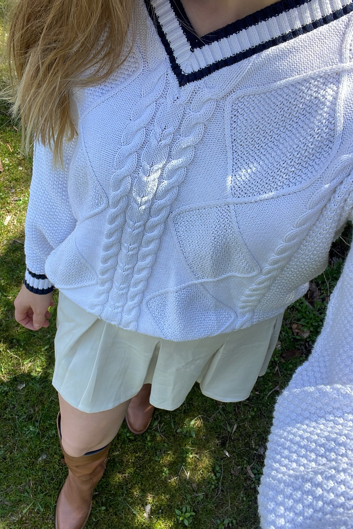 Mini skirt + sweater + boot weather! All items fit true to size. I love this skirt because it’s comfortable without being athletic material. 

#LTKfindsunder50 #LTKSeasonal #LTKshoecrush