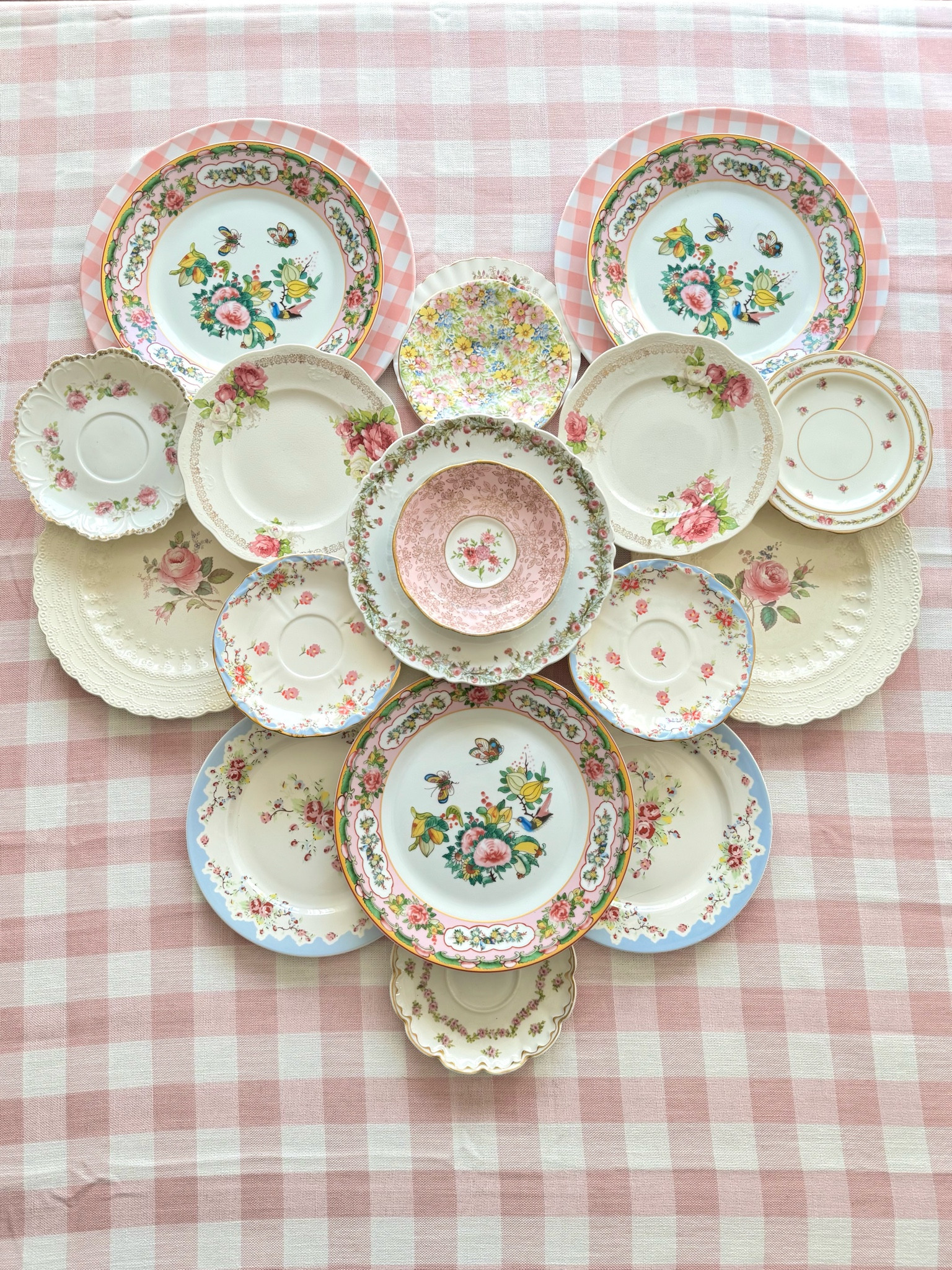 ✨ Pretty plates, endless charm! ✨ Sharing my love for china both new and vintage with this whimsical layered heart display. Mixing patterns, florals, and a touch of gingham for a truly collected look. Shop these finds to create your own charming china homage to amour! 

#vintagechina #tablescapestyling #LTKhome #grandmillennialstyle #chinoiseriechic

#LTKHome