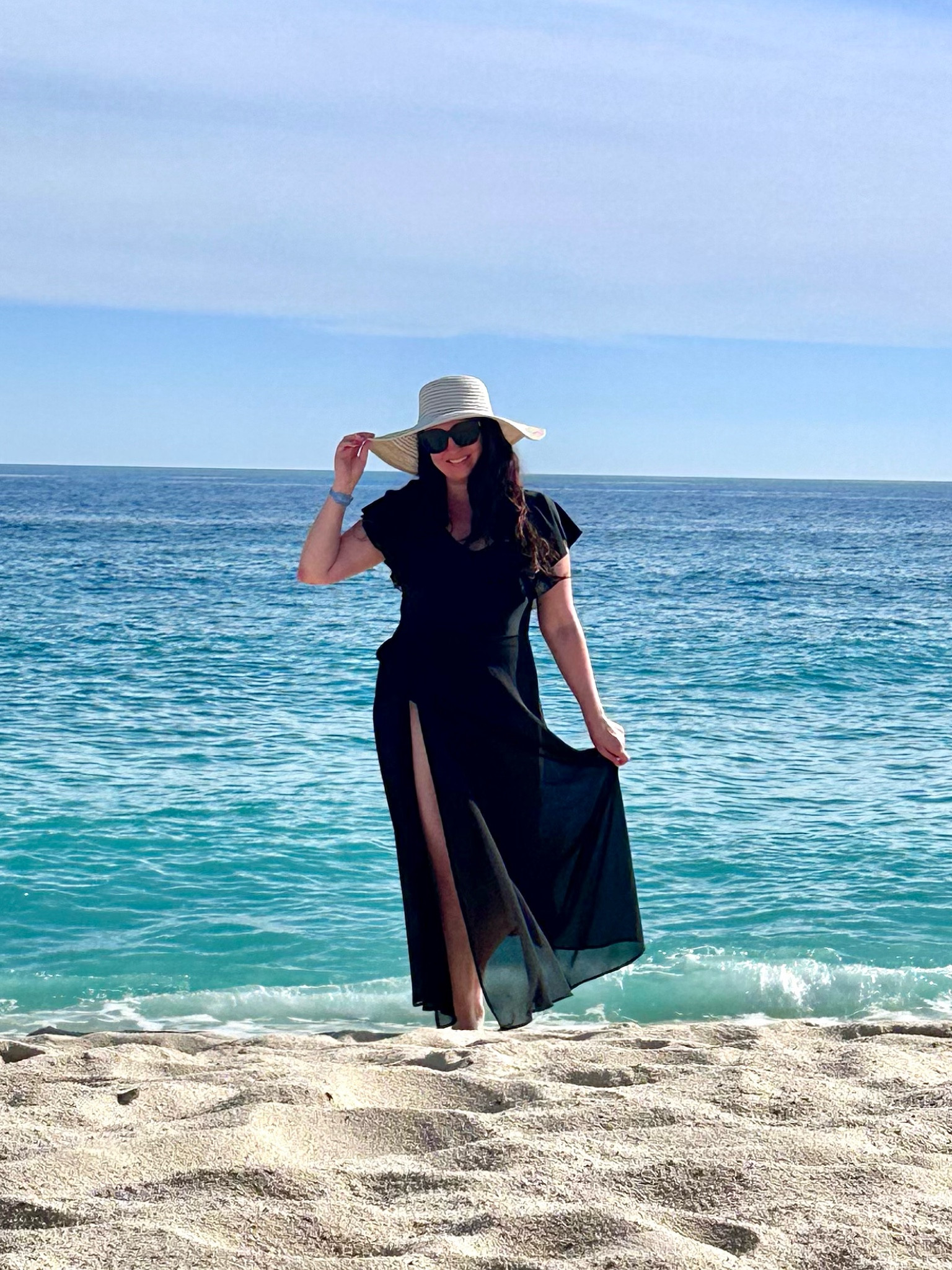 Beach vacay look: chic swimsuit with ruffle sleeves and long sheer coverup skirt that dries super quickly!

#LTKMidsize #LTKTravel #LTKSwim