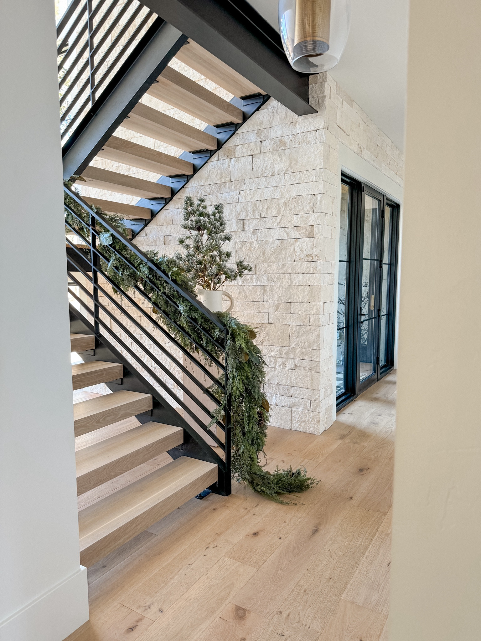 This is my favorite garland. I used two 10’ garlands. These sold out so fast! Next year I’ll let you know when they restock. U used zip ties to get these on the staircase. #mypotterybarn

#LTKHoliday #LTKhome #LTKSeasonal