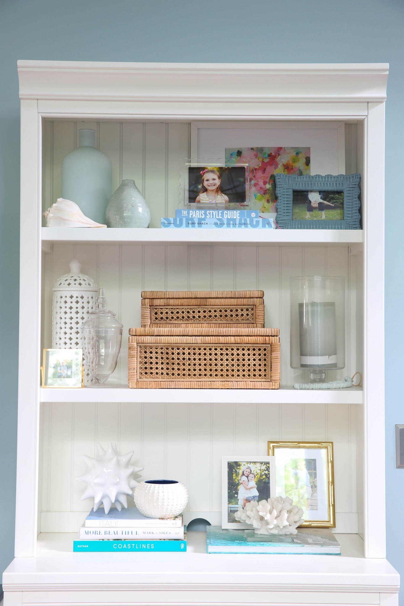 My shelf styling is all about blue and white coastal decor on this white Pottery Barn bookcase for a clean, layered, designer-inspired look. I love mixing coastal accessories, neutral textures, and modern coastal accents to keep it bright and curated, not cluttered.



#LTKU #LTKSaleAlert #LTKHome