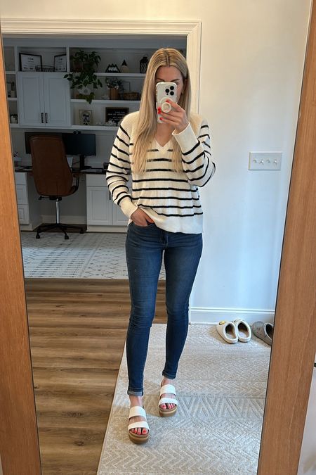 Monday morning ootd. It’s a bit rainy and chilly here so I wanted something lightweight and on the warmer side. Went with this lightweight striped sweater in size medium (sweater sold out-linked similar) paired with my fav Abercrombie jeans and sandals from Amazon. The sandals look JUST like the sandals from Reef but for a fraction of the cost. 

#LTKShoeCrush #LTKFindsUnder50 #LTKStyleTip