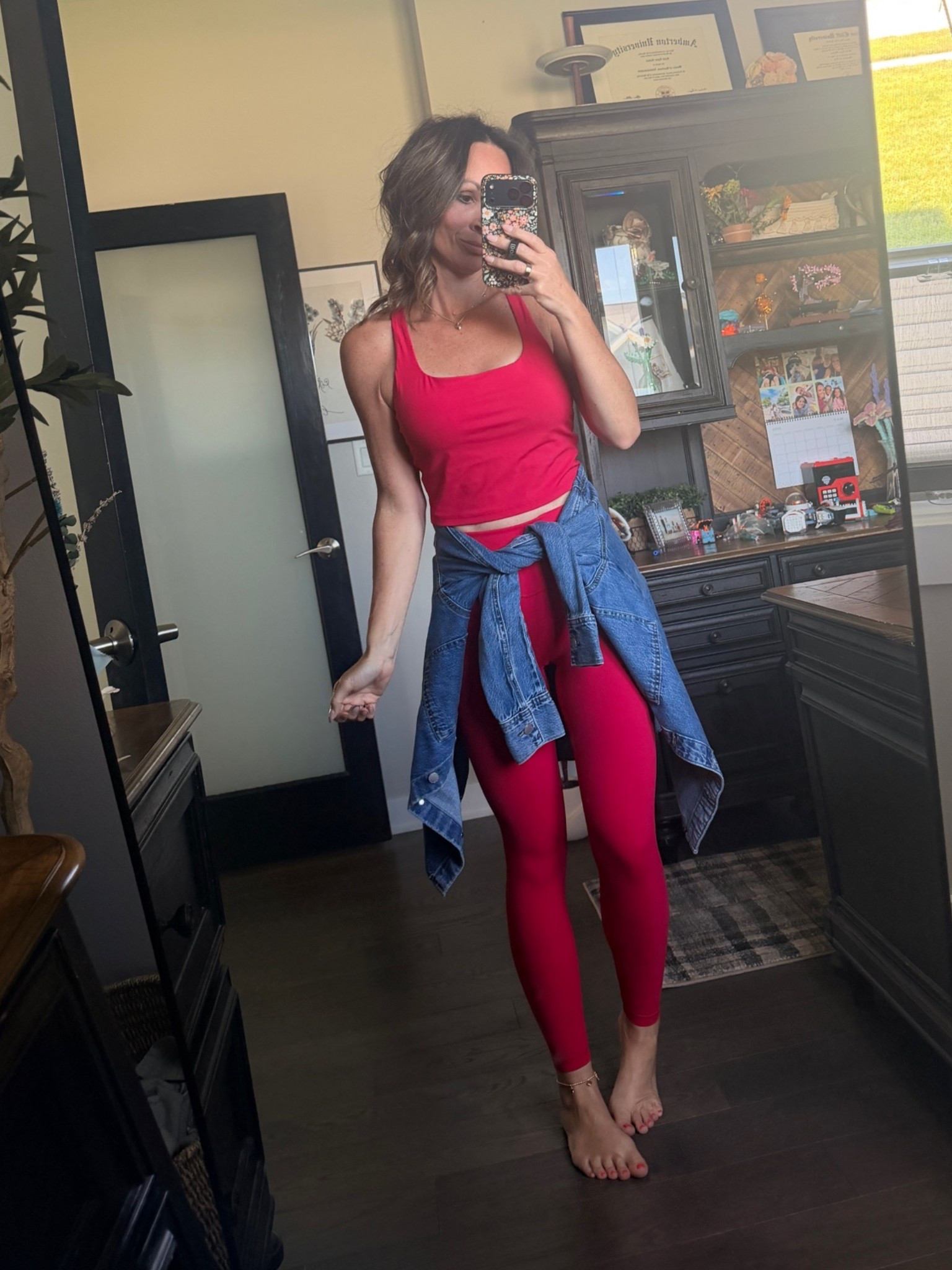 Medium and top, with built-in pads that are removable. My favorite leggings, in an extra small. If between sizes, size down. I absolutely love this red matching workout set. The leggings are like the align Lululemon ones, and have no front steam and are so amazing for around $30! If your team colors are red, you’re definitely need to try these. And, the amazing Aritzia denim shirt that you can wear 1 million different ways, I just threw around my waist to run some errands. So good! If you need some closet, staples, these are ones you can get a lot of wear out of. ￼

#LTKSeasonal #LTKOver40 #LTKActive