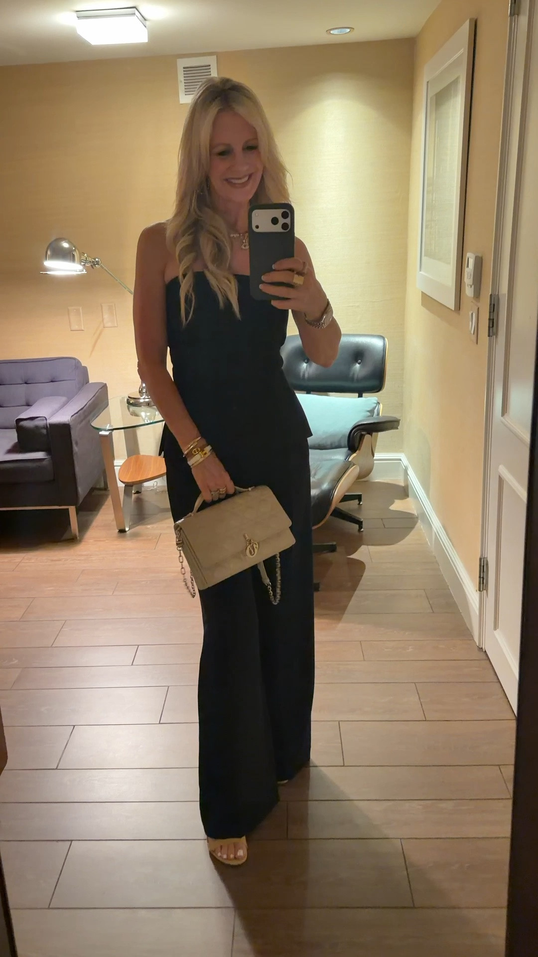 After a long day of editing our film, we’re heading out for dinner. This two-piece ensemble from Aritzia is still one of my favorites. The classic black color is always a safe choice, and the strapless top adds a touch of sexy flair.

#LTKdayinmylife #LTKTravel #LTKOver40