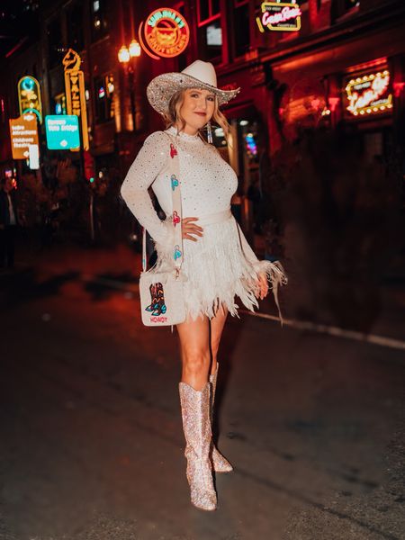 My favorite look from my bachelorette party 🤍
Top is Thomas Runway
Skirt is Hazel & Olive
Boots are Amazing Lace

#NashvilleBachelorette #NashBash #BridesLastRide #WesternOutfit #bride   

#LTKwedding #LTKunder50 #LTKstyletip