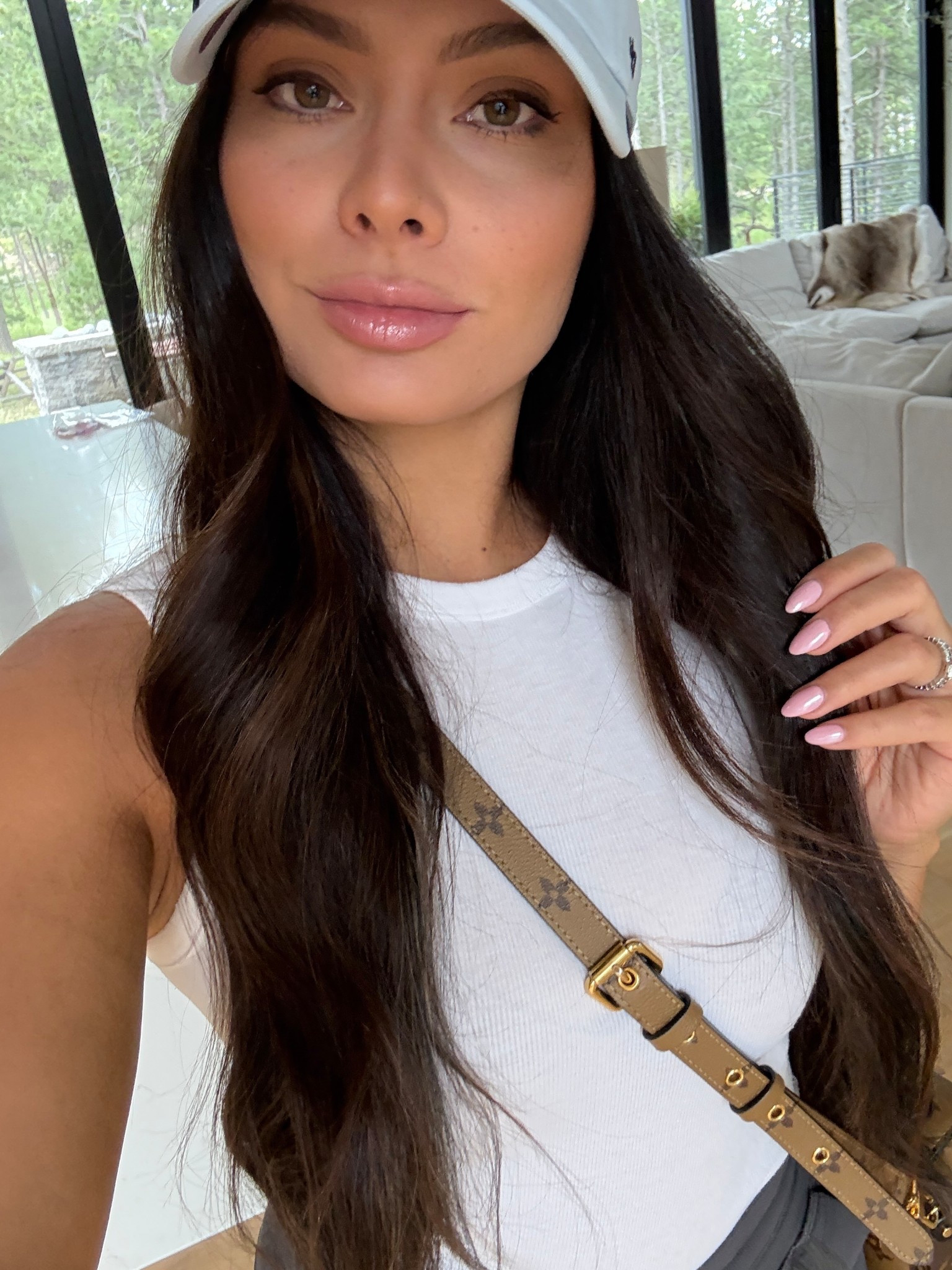 Literally obsessed with this hat! The color is so flattering and I love the cute patches. Can’t go wrong with this Crossbody. I’ve had it for a few years. This tank is a staple you can make it casual or elevated. Then these cargoes, I swear by. A little oversized, but perfect perfection. I’m wearing a size small. You have to jump on these when in stock. Sells out fast. 

#LTKItBag #LTKHome #LTKStyleTip