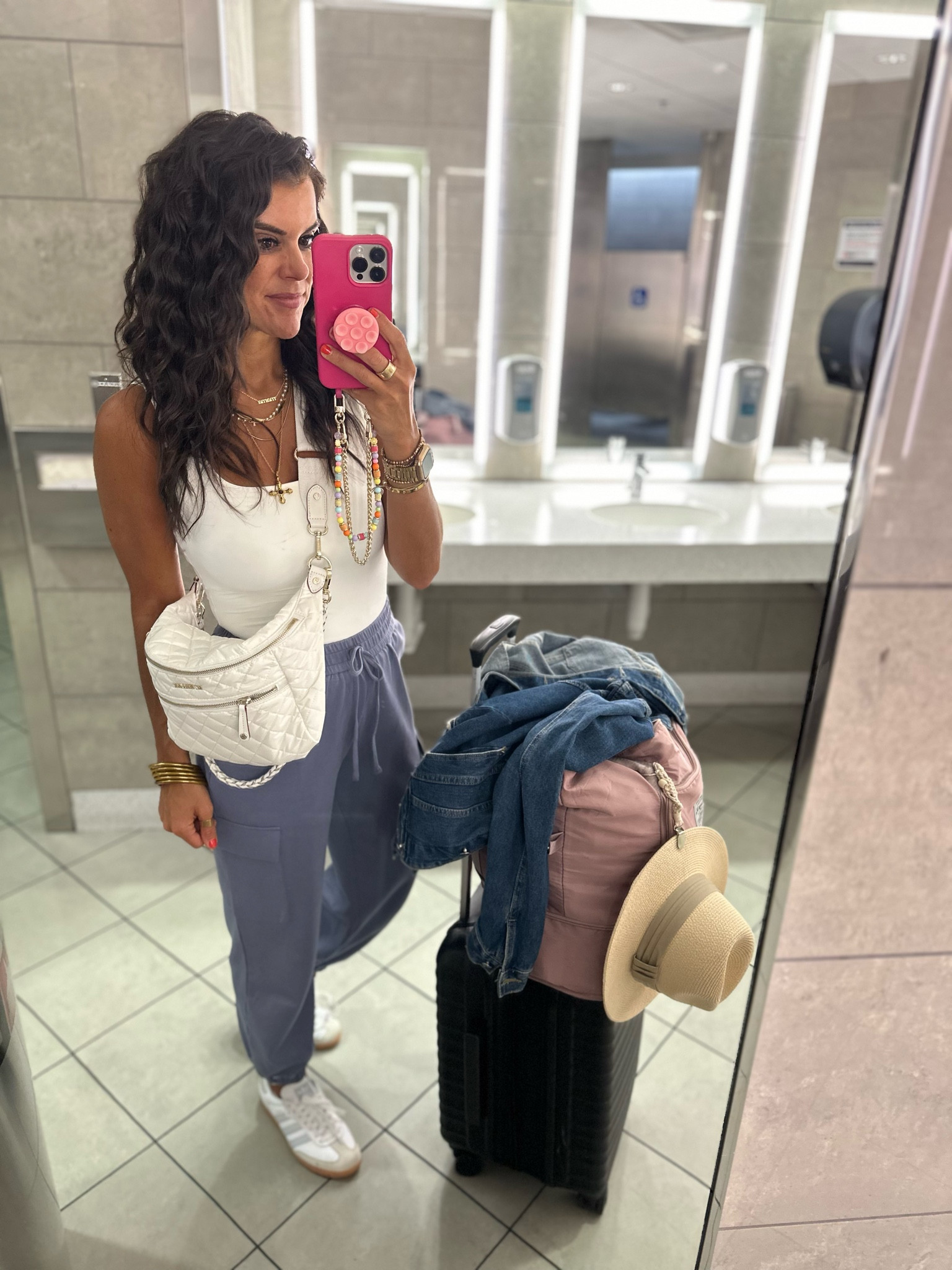 Amazon travel look all on sale today! Size small in tank and joggers. Sneakers tts 

#LTKxPrimeDay #LTKTravel #LTKStyleTip