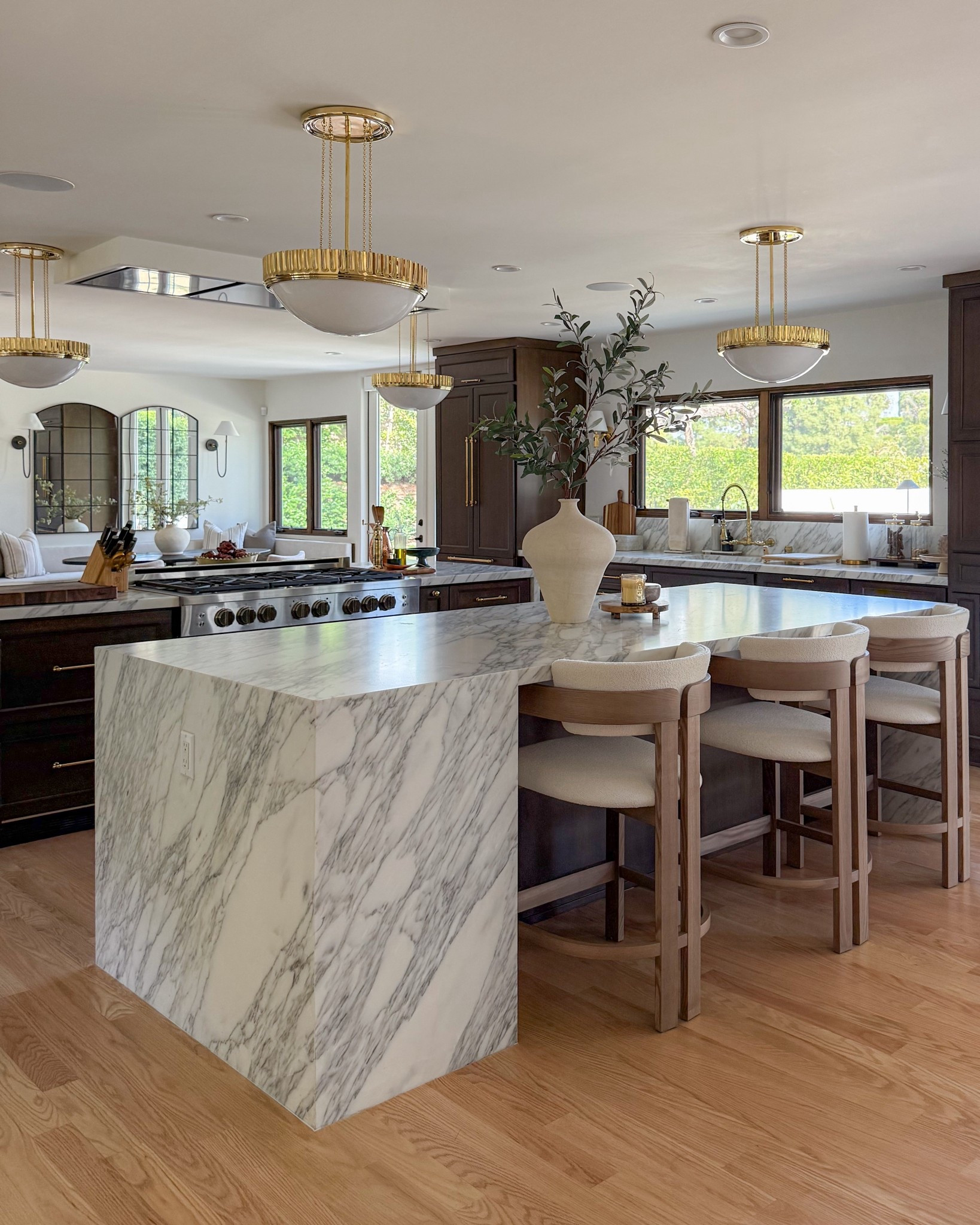 Kitchen makeover! All finishes are unlacquered brass. Linking a look for less for our counter stools and the similar sconce style I could find! 

#LTKStyleTip #LTKSaleAlert #LTKHome