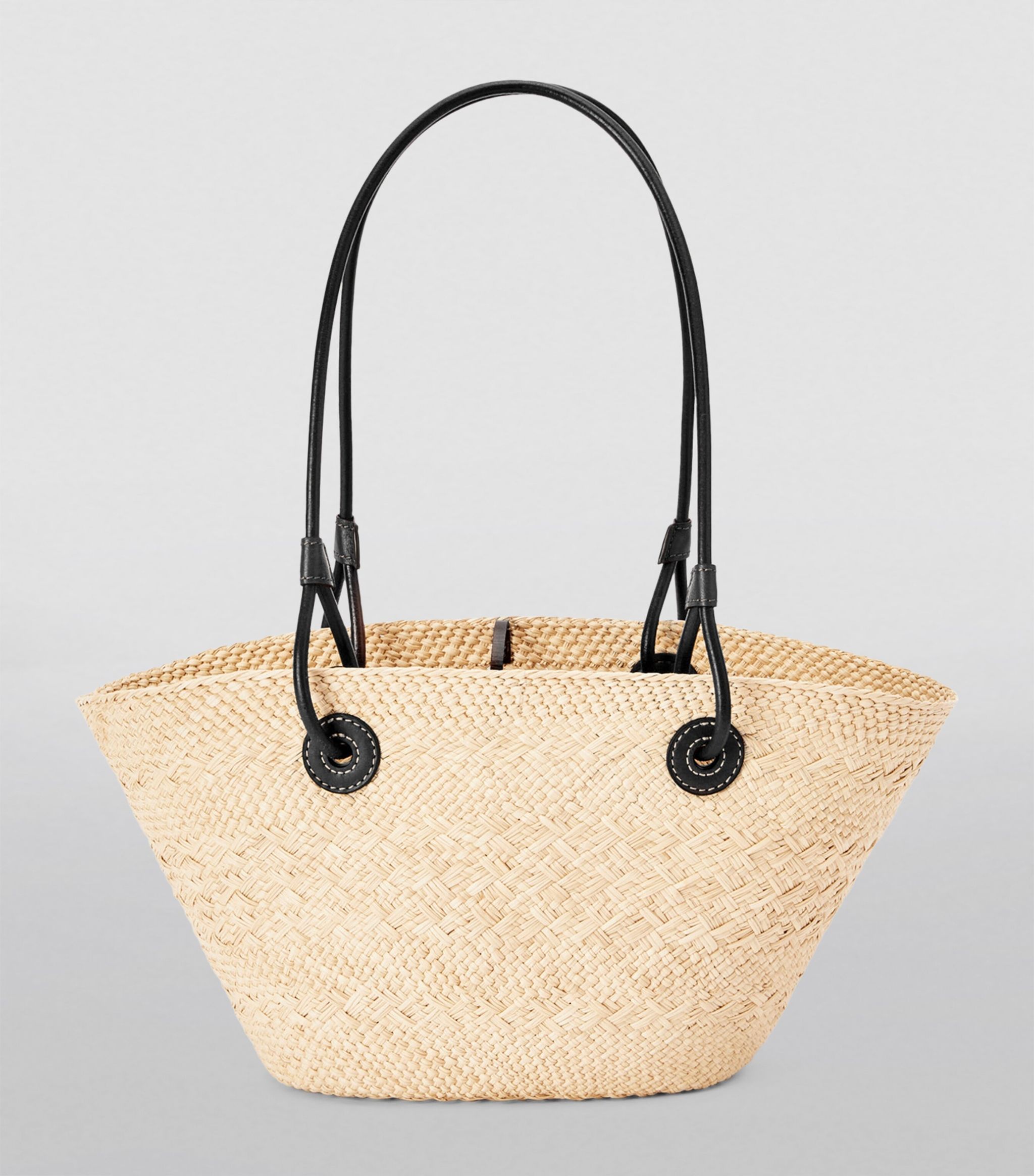 x Paula’s Ibiza Small Woven Anagram Basket Bag | Harrods