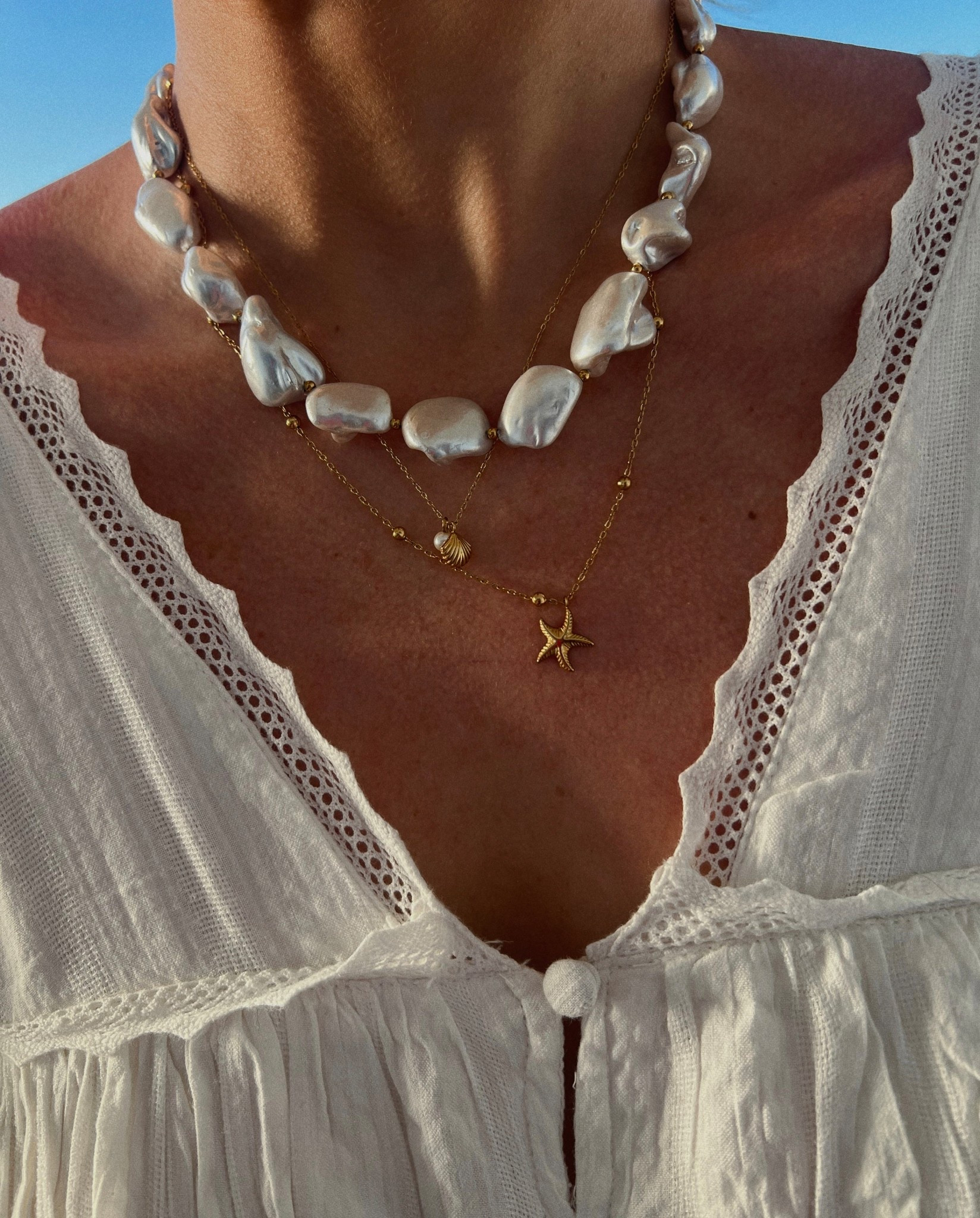 Beach vacation accessories on repeat / these are water-resistant jewelry pieces / water pearl necklace 