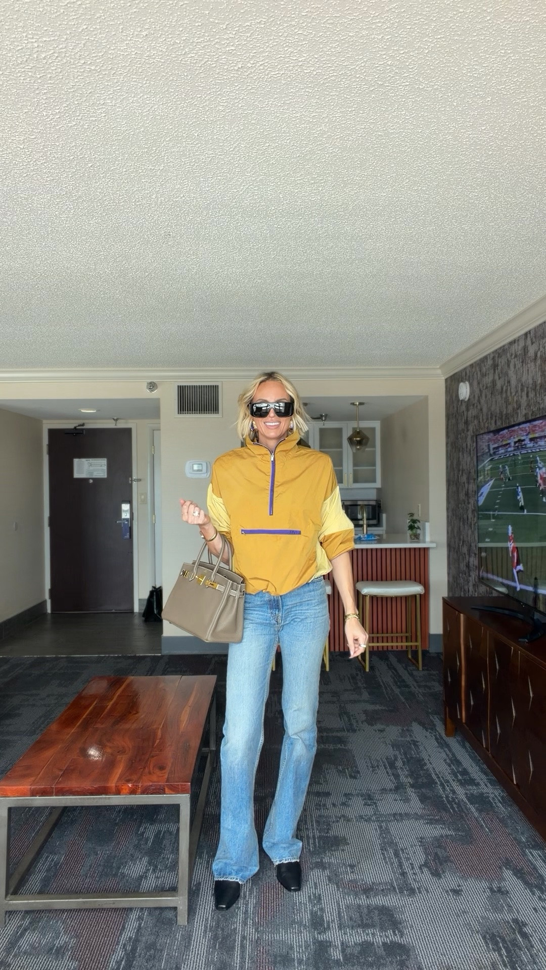So it’s family weekend at my son’s college. There is a game and apparently tailgating and it’ll be a whole day affair and I don’t know if I’m ready for this.😂😅 anyway the colors of the college are purple and gold so I thought this wouldn’t breaker was perfect! The color way of my windbreaker is sold out, but they came out with a purple one, which is incredible. I think I’m going to buy that color too. Also, the earrings were like made for this. I’m just so mad at myself that I forgot to bring my purple sequin Fendi bag! I did bring my purple gloves, but my husband rolled his eyes so I decided not to wear them 🙄 i’m wearing a medium in the windbreaker. Jeans are amazing! I will say when I first tried them on. They were very tight around the thighs, which was weird, but they loosened up. And they were tied around the waist, but that also loosened up. So buy your usual size! Tall girl friendly. Boots are amazing and such a great price point. They run tts￼￼


@stevemadden-us @Reformation

#LTKOver40 #LTKTall #LTKdayinmylife