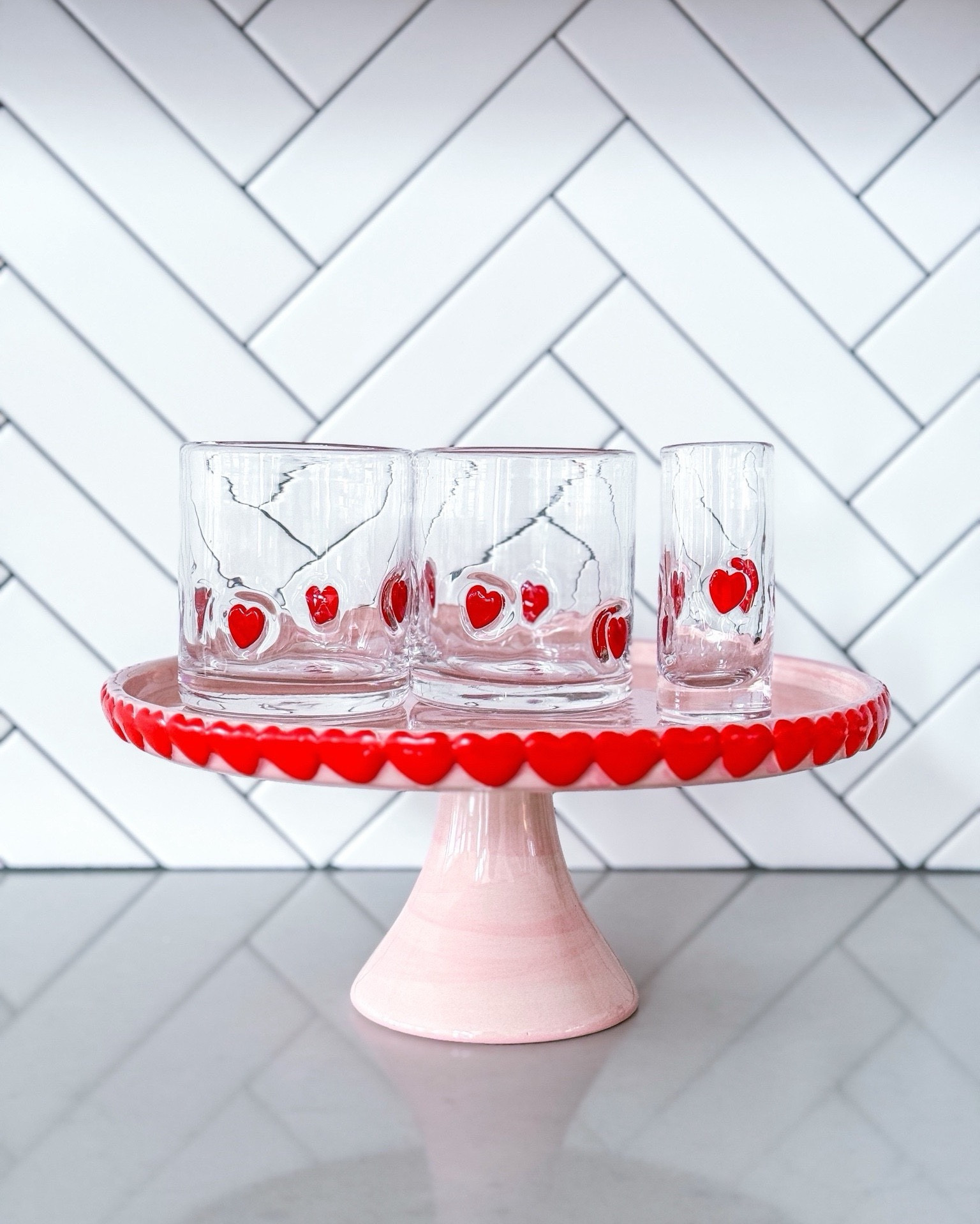 These are the kind of details that make a table feel intentional. Subtle icons, simple shapes, & just enough Valentine energy. Perfect for a Galentine’s lunch, a casual dessert spread, or styled on the counter all month. I’m linking these & a few newer glass styles I’ve been eyeing too.

valentines table styling - galentines lunch ideas - icon glassware - subtle valentines decor - heart glass cups - bow detail glassware - entertaining essentials - elevated hosting - seasonal kitchen styling - neutral valentines - modern holiday decor - everyday entertaining