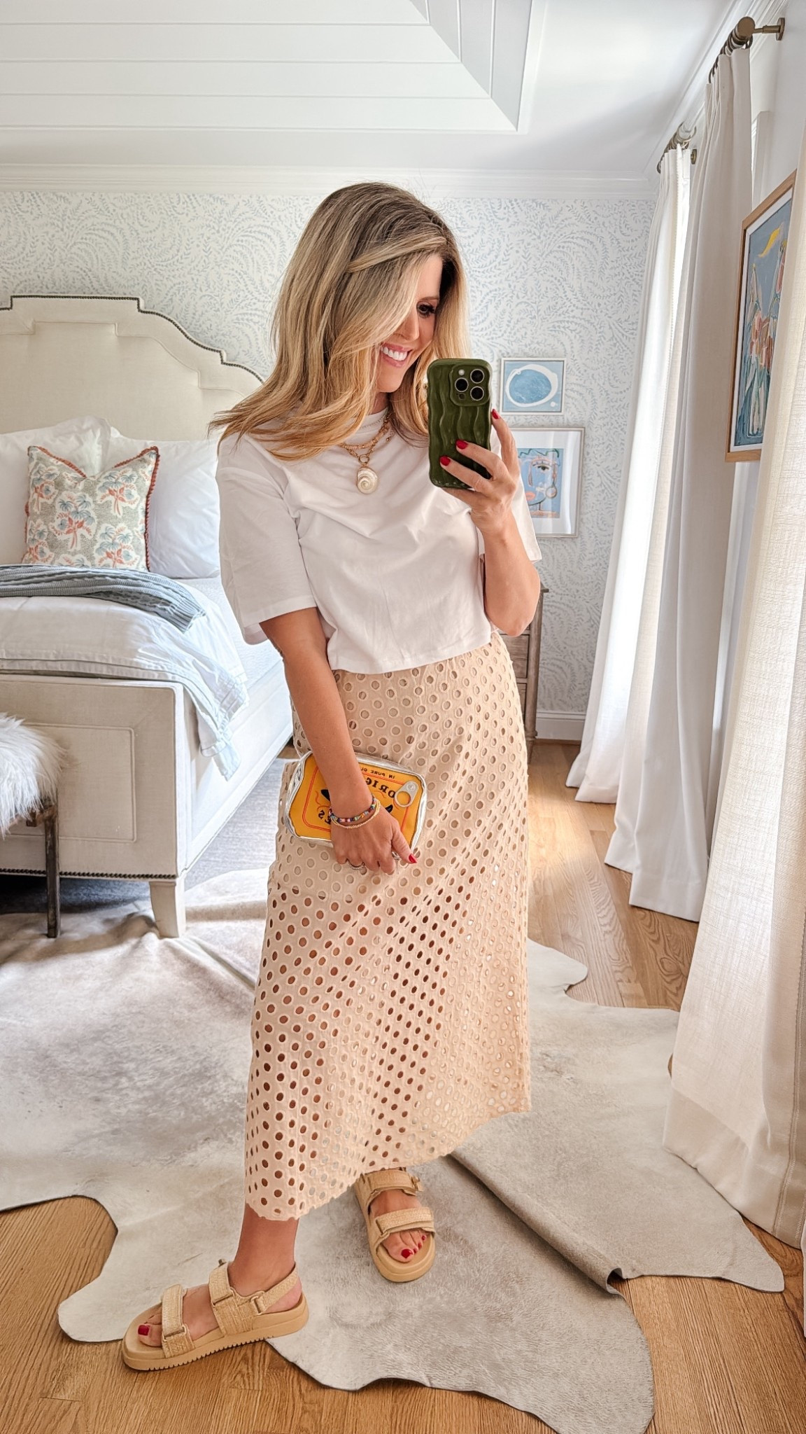 Amazon skirt, Amazon cropped box tee and the cutest little cosmetic bag that I use as a clutch. I’m a small in the skirt and T-shirt. 

#LTKSaleAlert #LTKOver40 #LTKFamily