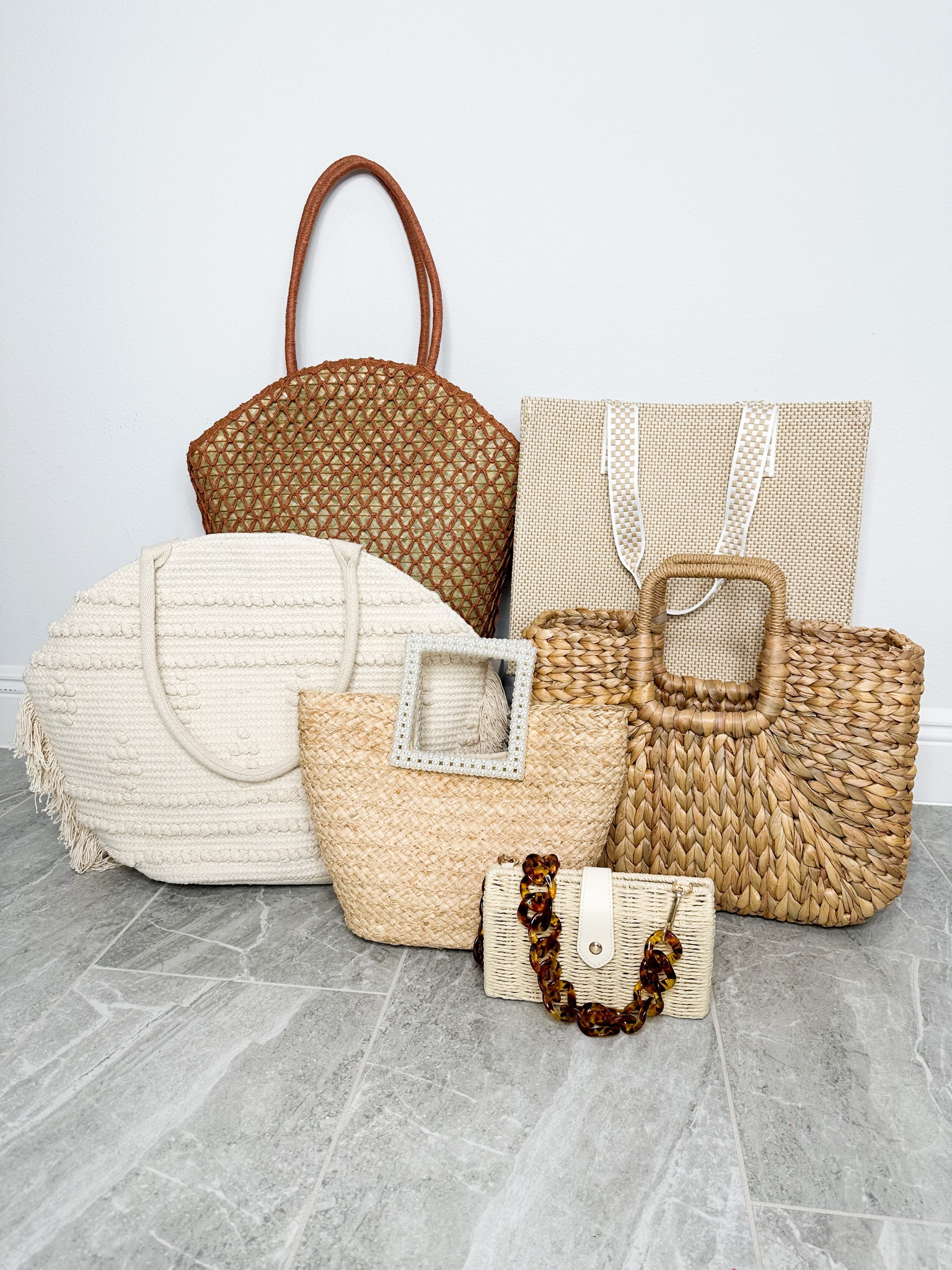 NEW Target purses and totes for Spring and Summer! Small chain purse is a designer dupe for only $35! Take chain off and it becomes a clutch. An additional strap is included to turn it into a crossbody. Mini tote has pretty pearl handles. Comes in pink. Larger totes and bags are great for vaca to use at the pool/beach and also pretty enough to take to dinner. All bags are under $50. 

#LTKunder50 #LTKstyletip #LTKSeasonal