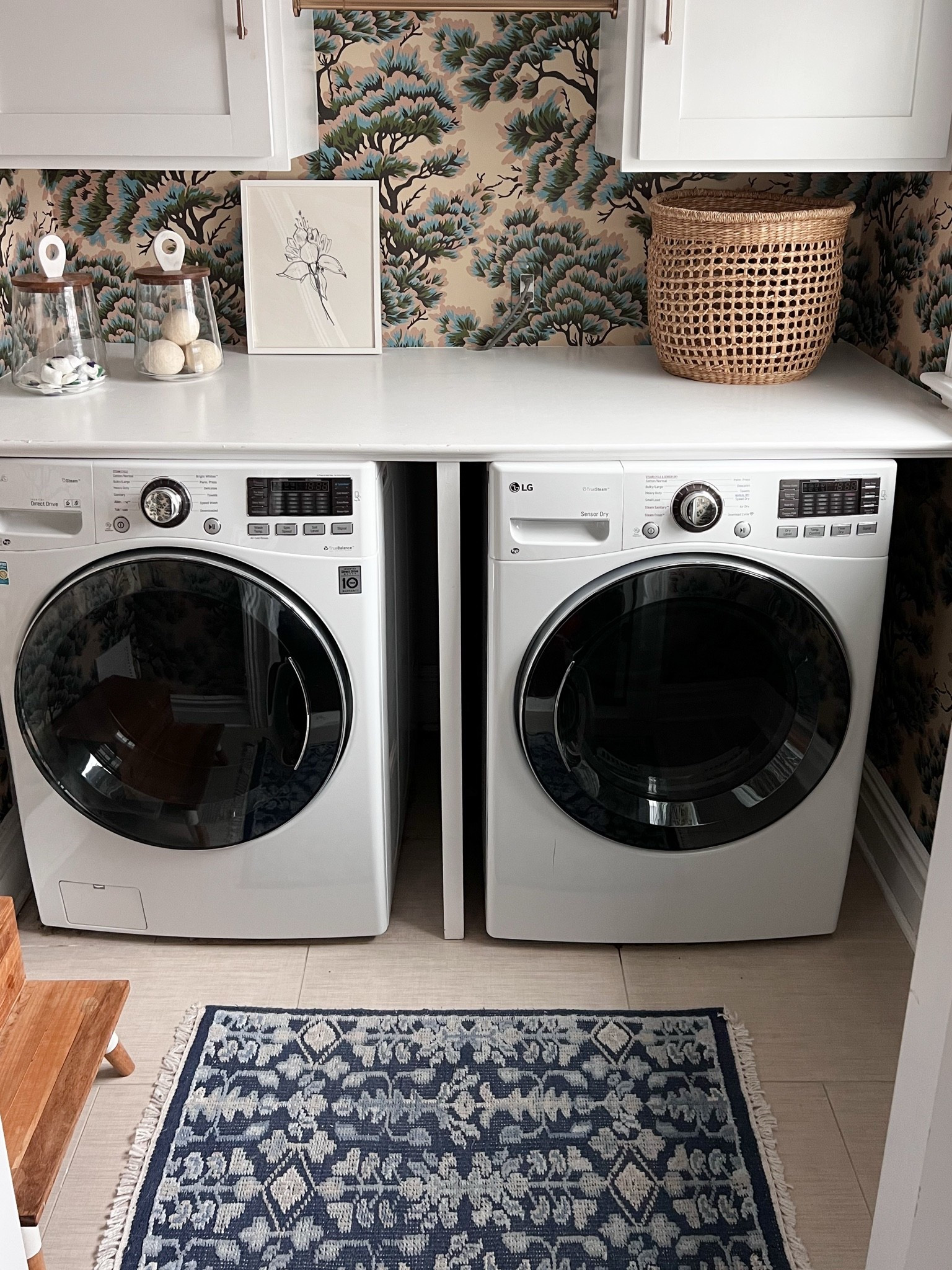 One of my favorite ways to make a laundry room feel elevated is with a beautiful runner. This blue vintage inspired rug adds the perfect pop of pattern, softens the space, and makes everyday chores feel a little more enjoyable.
Laundry room rug, blue runner rug, vintage inspired rug, washable runner, laundry room ideas, home décor, neutral home, traditional home, hallway runner, Loloi rug, GirlOnTheHudson

#LTKHome #LTKSeasonal #LTKselfcare